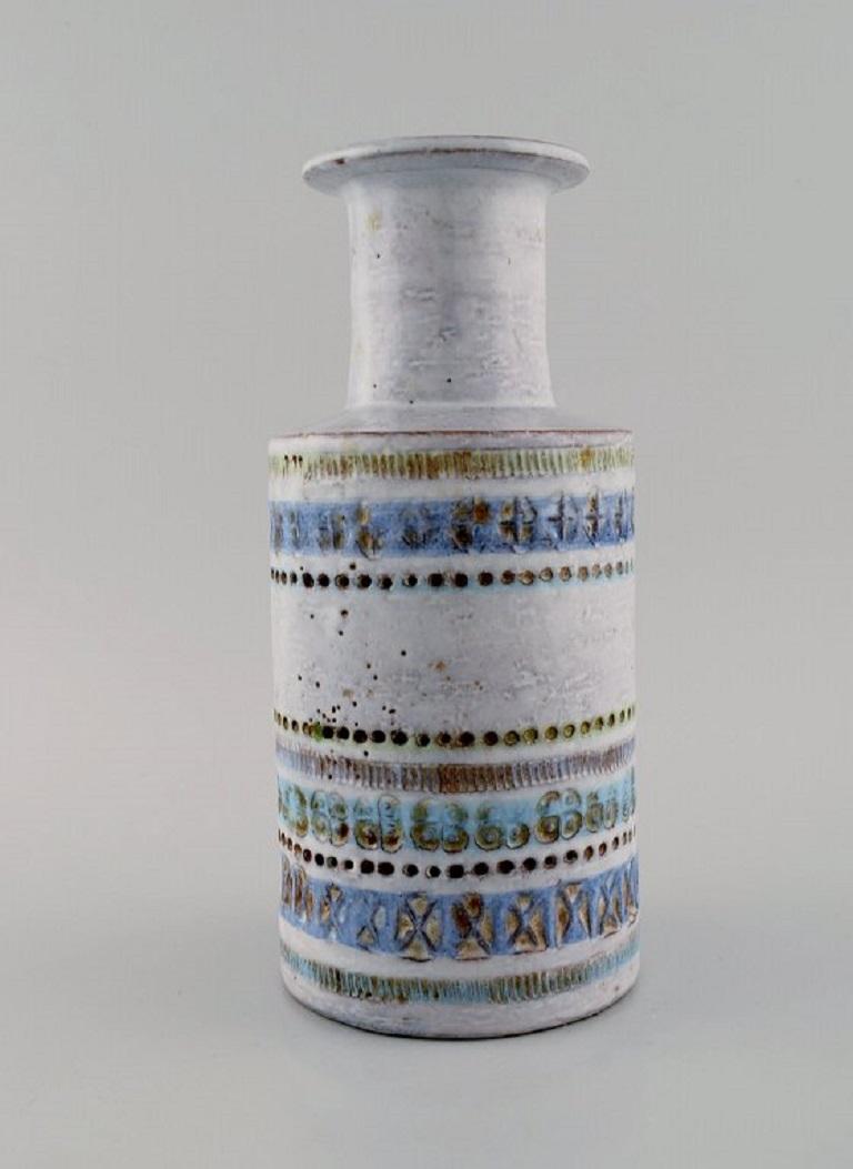 Bitossi vase in glazed ceramics. 
Beautiful glaze in light blue shades. Striped design. 
Mid-20th century.
Measures: 24.3 x 11.5 cm.
In excellent condition.