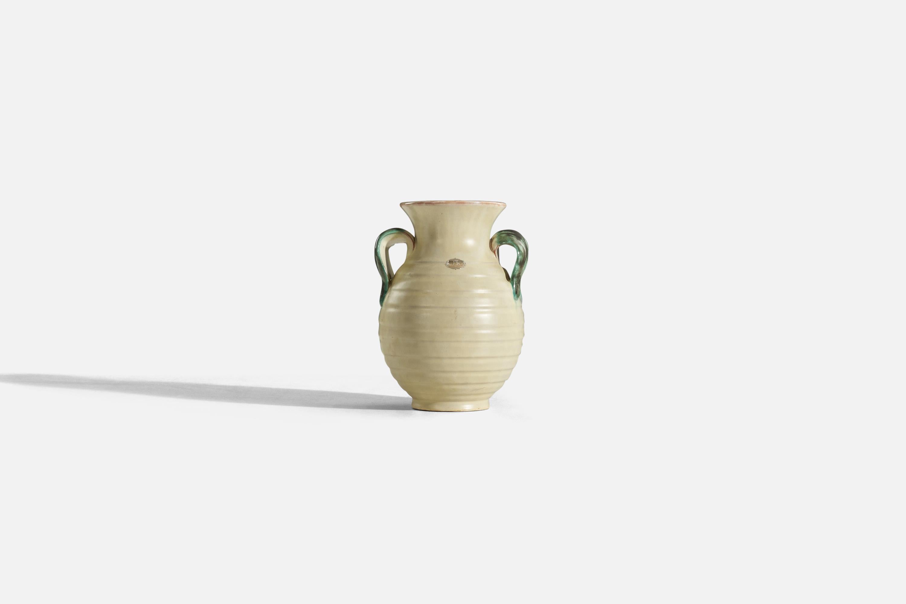 A light yellow, glazed earthenware vase designed and produced by Upsala-Ekeby, Sweden, 1940s. 

