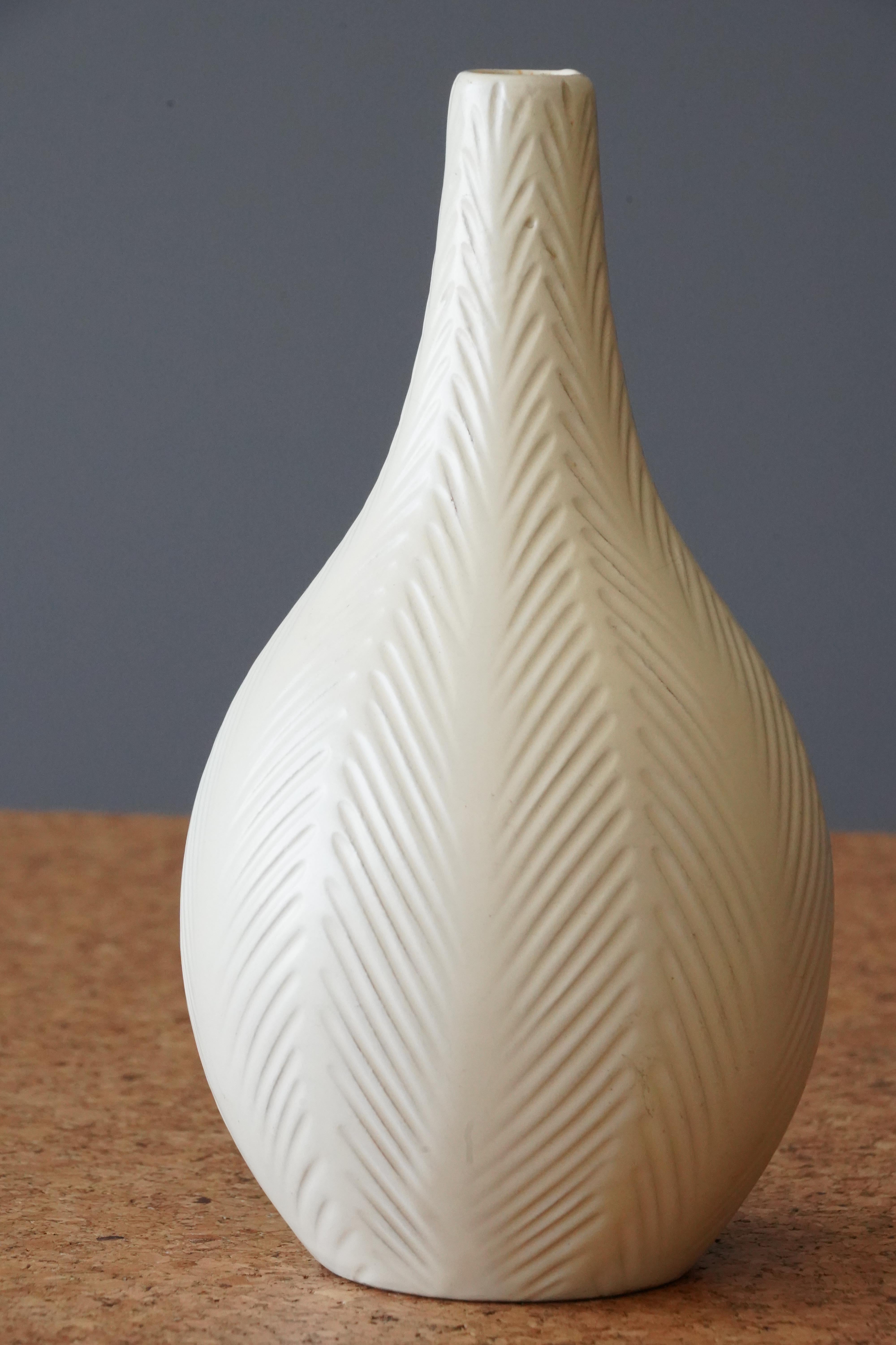 An early modernist vase. Produced by Upsala-Ekeby, Sweden, 1930s.

Other designers of the period include Ettore Sottsass, Carl Harry Stålhane, Lisa Larsson, Axel Salto, and Arne Bang.