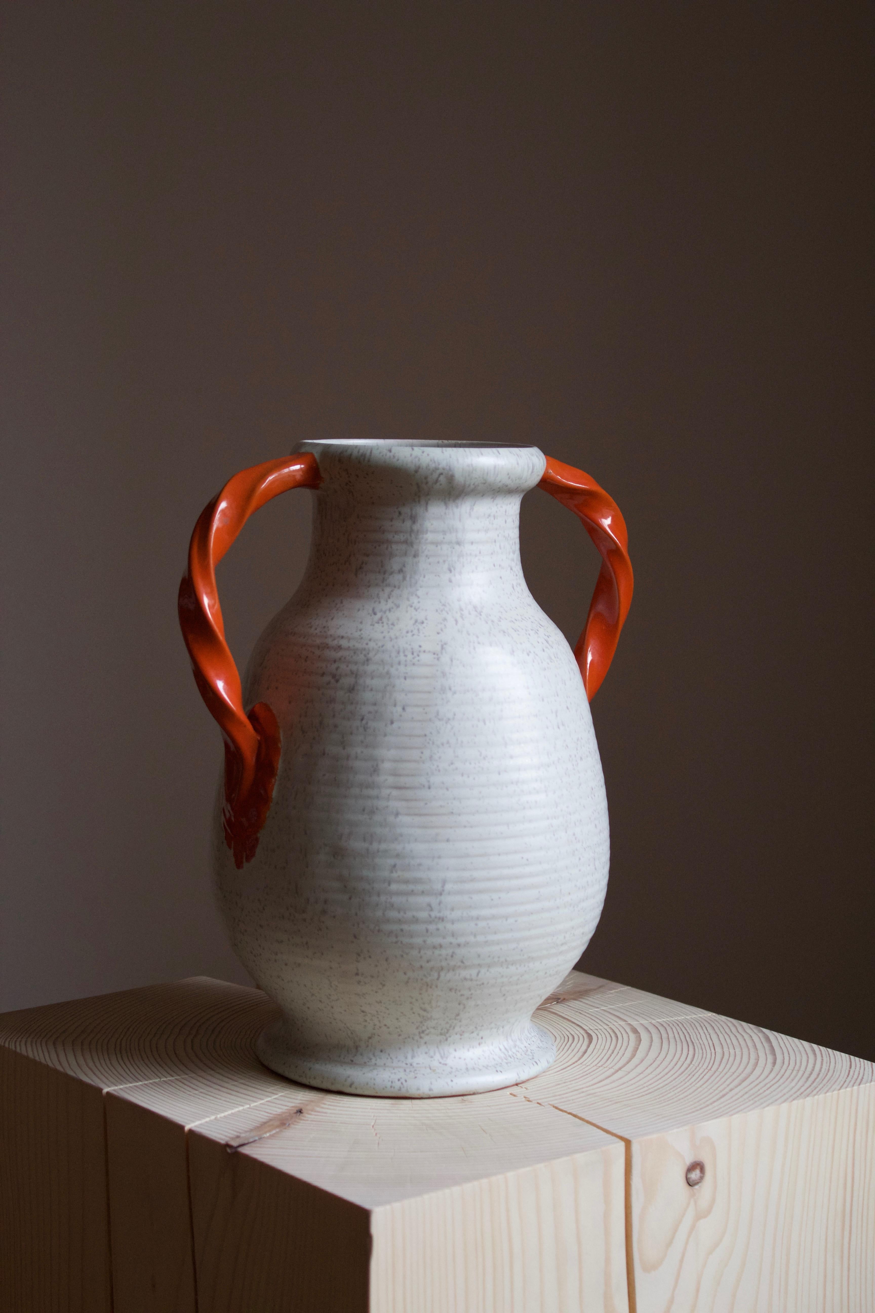 An early modernist vase. Produced by Upsala-Ekeby, Sweden, 1930s.


Other designers of the period include Ettore Sottsass, Carl Harry Stålhane, Lisa Larsson, Axel Salto, and Arne Bang.