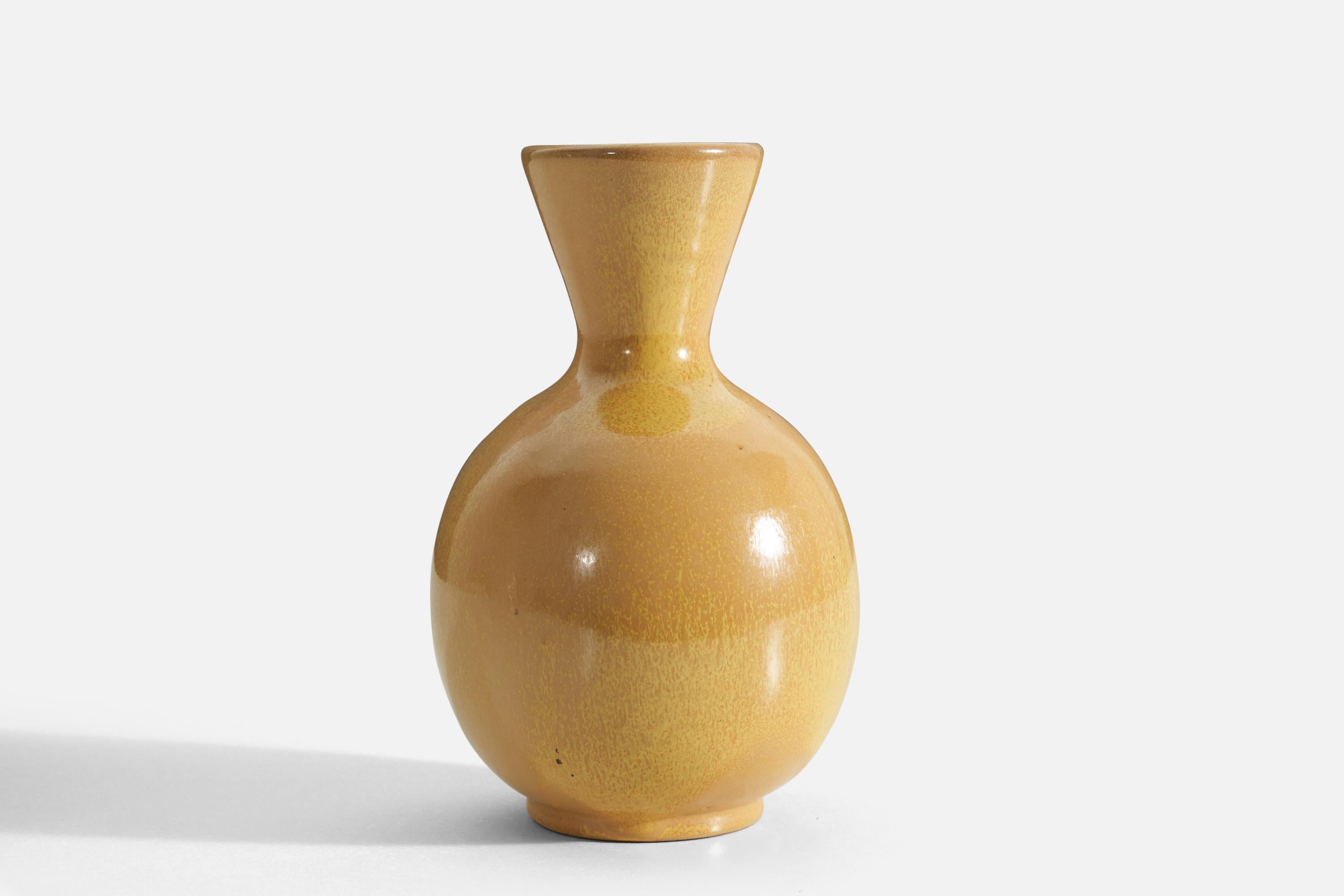 A yellow-glazed earthenware vase produced by Upsala-Ekeby, Sweden, 1940s. 

 