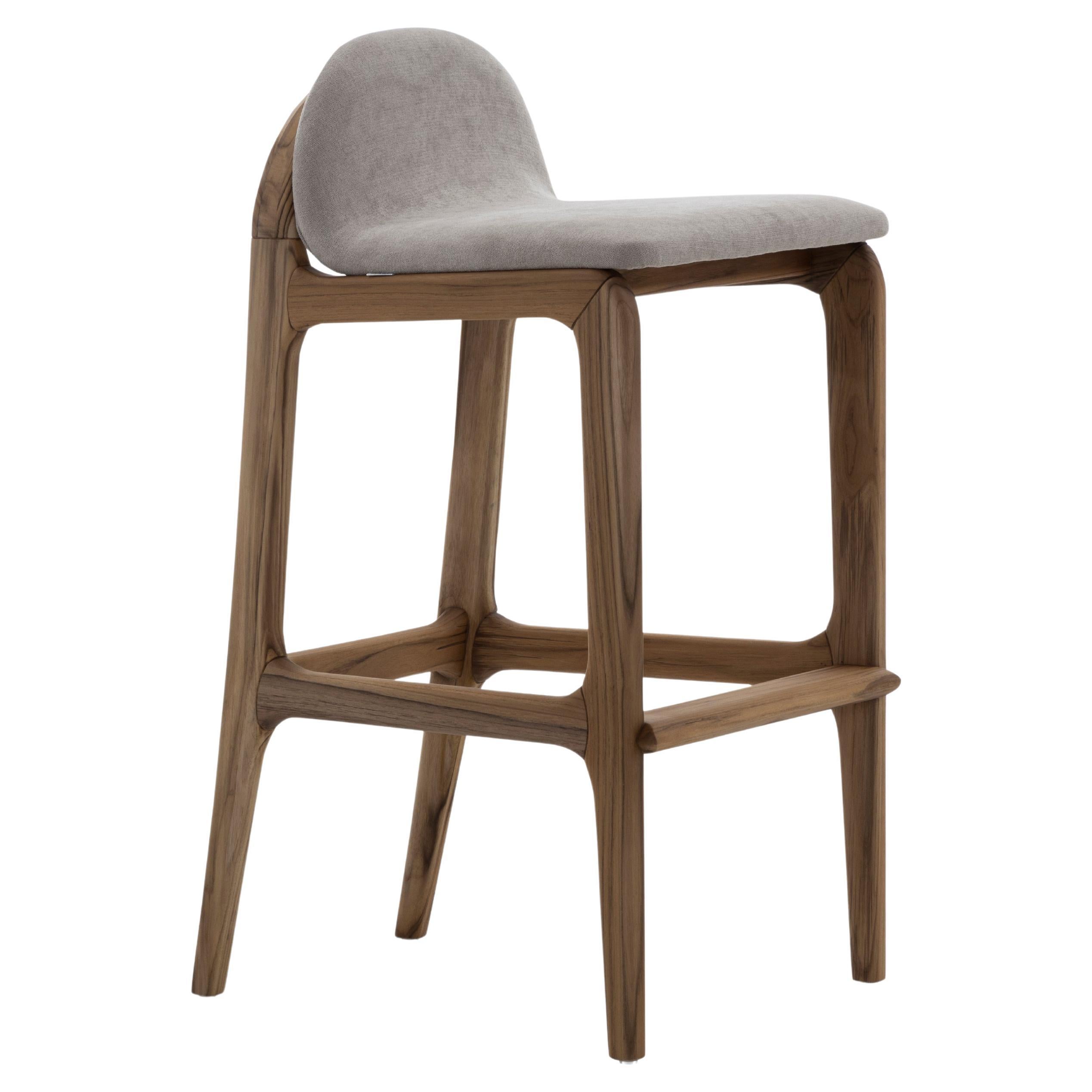 Ura Counter Stool in Teak Wood Finish Base and Upholstered Light Grey Seat For Sale