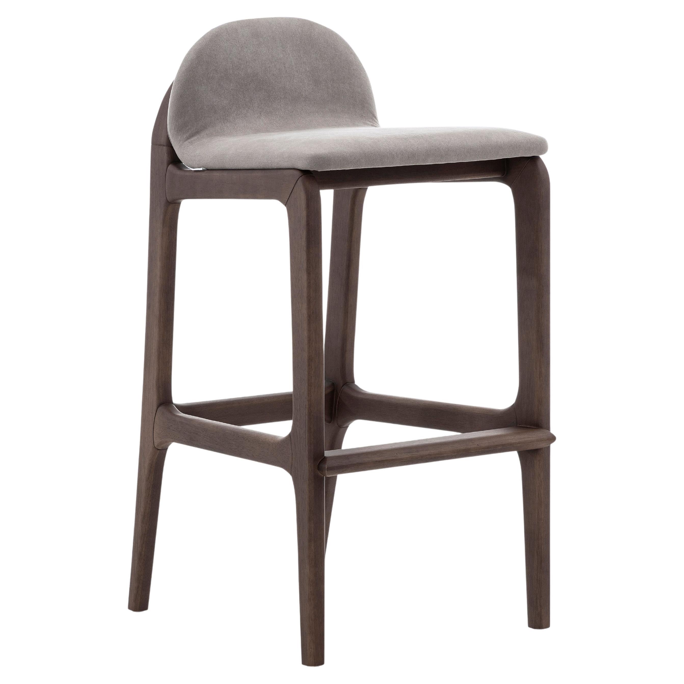Ura Bar Stool in Walnut Wood Finish Base and Upholstered Light Brown Seat For Sale