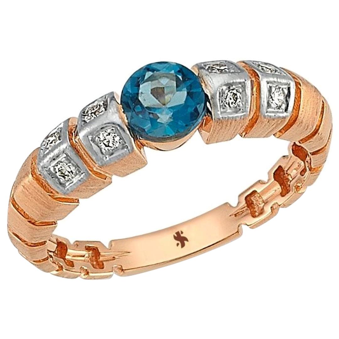 Uraeus Blue Topaz Ring in Rose Gold with Diamond For Sale