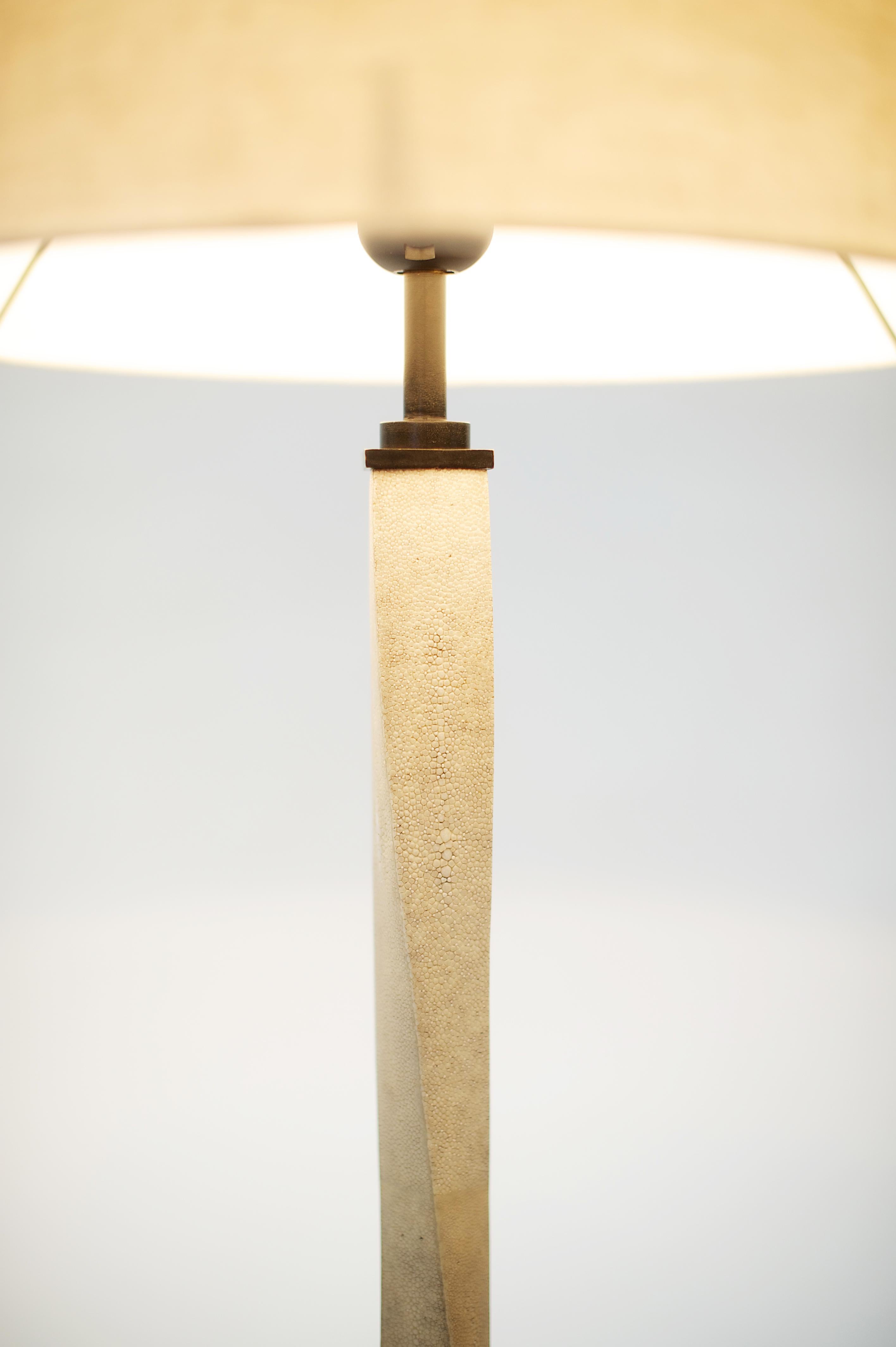 Available now and ready to ship! 

Description/
Shagreen and bronze floor lamp produced using the superior lost wax bronze casting process, hand-rubbed and finished in selected patina. 

Dimensions/
Small/
dia 15.7 x h 59.8 in
dia 40 x h