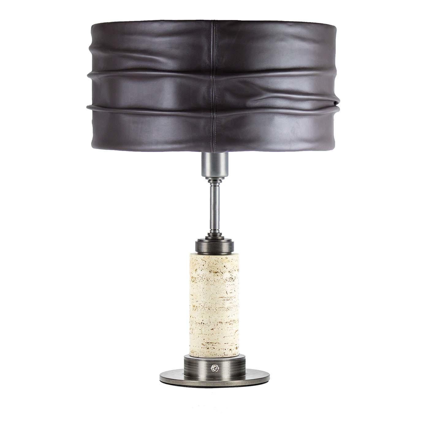 Classically modern and exquisitely handcrafted, this table lamp features an exquisite drum style shade in elephant-gray leather whose light brown tones coordinate well with the fine travertine column the embraces the stem. The round base is made of