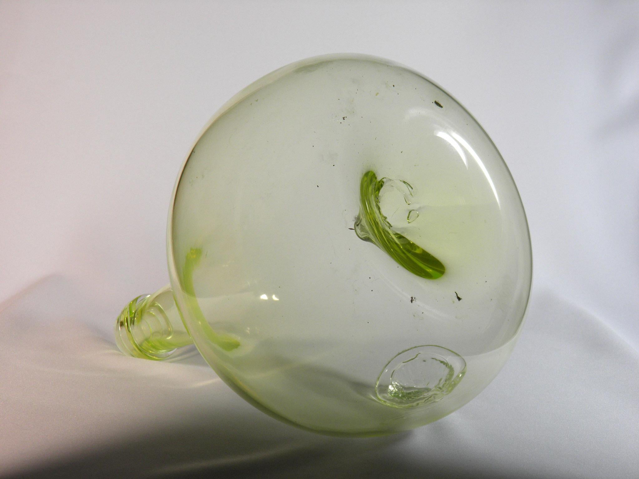 Hand-Crafted Uranium Glass Bottle with a Sculpture of a Lion, 'video' For Sale