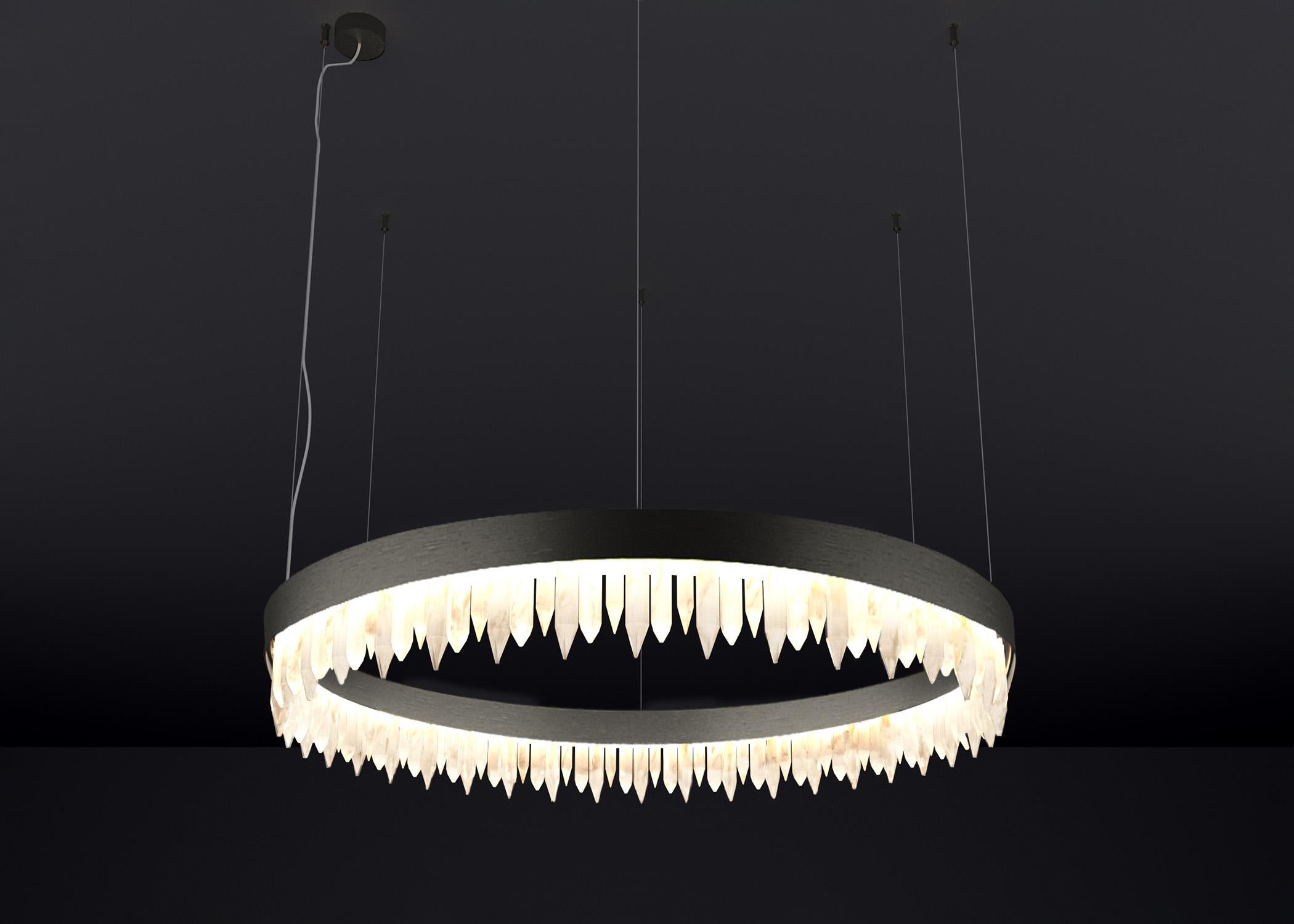 Urano Brushed Black 60 Pendant Light 1 by Alabastro Italiano
Dimensions: Ø 60 x H 20 cm.
Materials: Glass and brushed black metal.

2 x Strip LED, 81 Watt 8121 Lumen, 24 V, 3000 K

Available in different sizes: Ø 60, Ø 80, Ø 100 and Ø 120 cm.