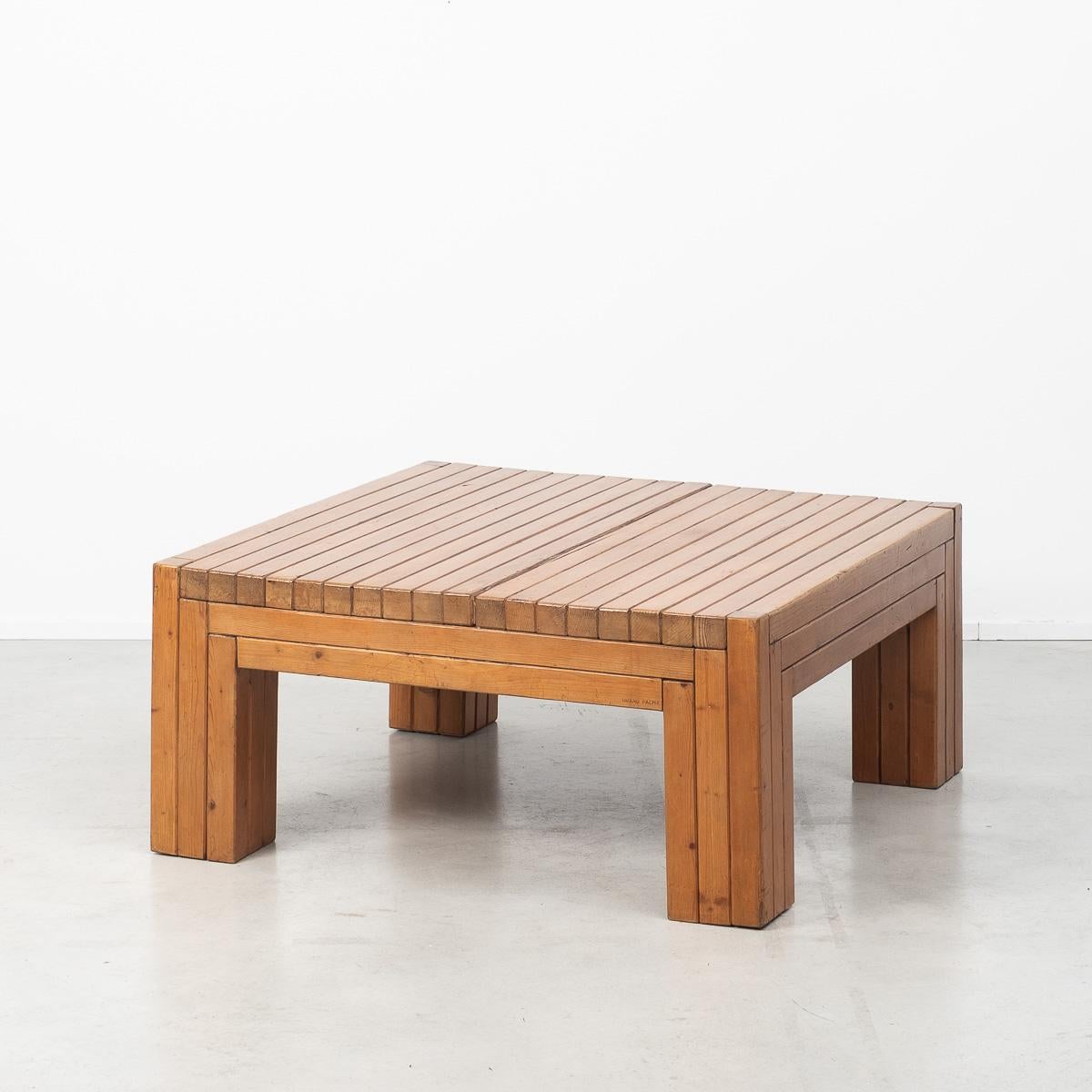 This solid wood coffee table, possibly made of elm, was designed and crafted by multidisciplinary Italian artist and designer Urano Palma. A figure of the Avant Garde, Palma was perhaps best known for his intricate handmade pieces in wood, such as