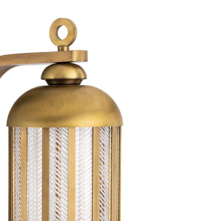 Italian Urban brass wall light with textured glass