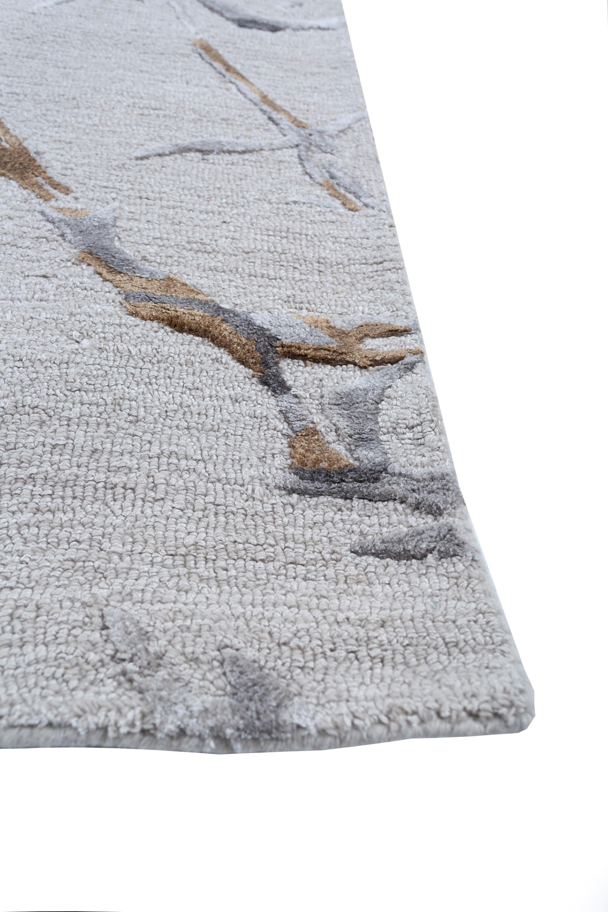 Indulge in luxury in the most comfortable way with this hand tufted wood rug from our Genesis collection. The color palette of antique white and warm spice doesn't just decorate, it displays class, making your room look rich without a hint of