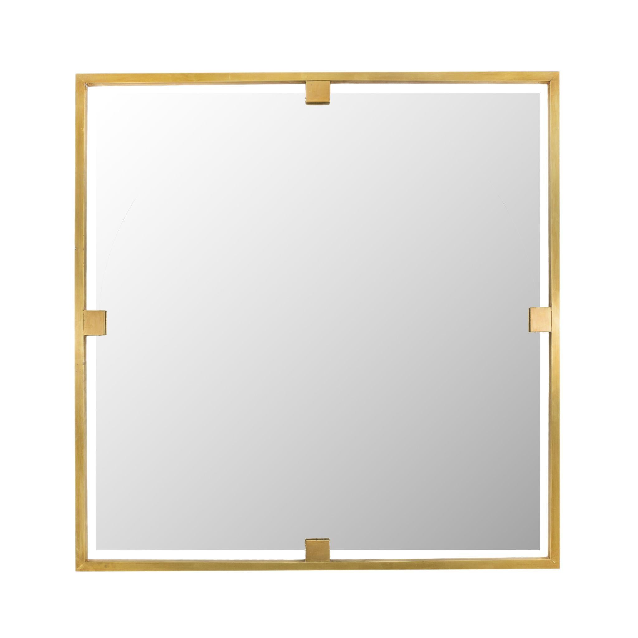 Large square mirror with brass edging and clips from the Timeless collection. Its shape is geometric and clean, if chosen in nickel or chrome finishes it is perfect for creating a sense of amplitude in a bathroom that is not too large or in natural