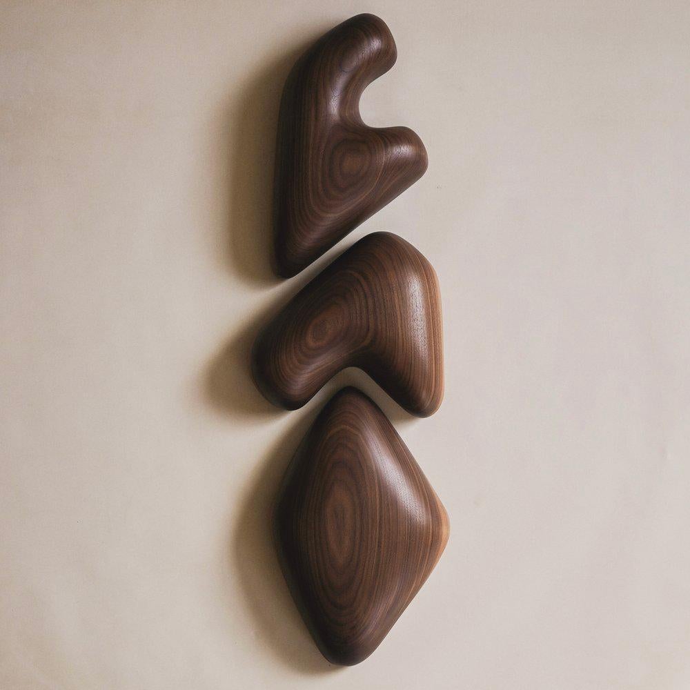 Urbmon 802 Wall Hanging Sculpture by Chandler McLellan
Dimensions: W 35 x H 119,4 cm. 
Materials: Walnut.

Various sizes are available by commission. Price will depend on size. 119,4 cm height includes a planned 5,08 cm space between each section.
