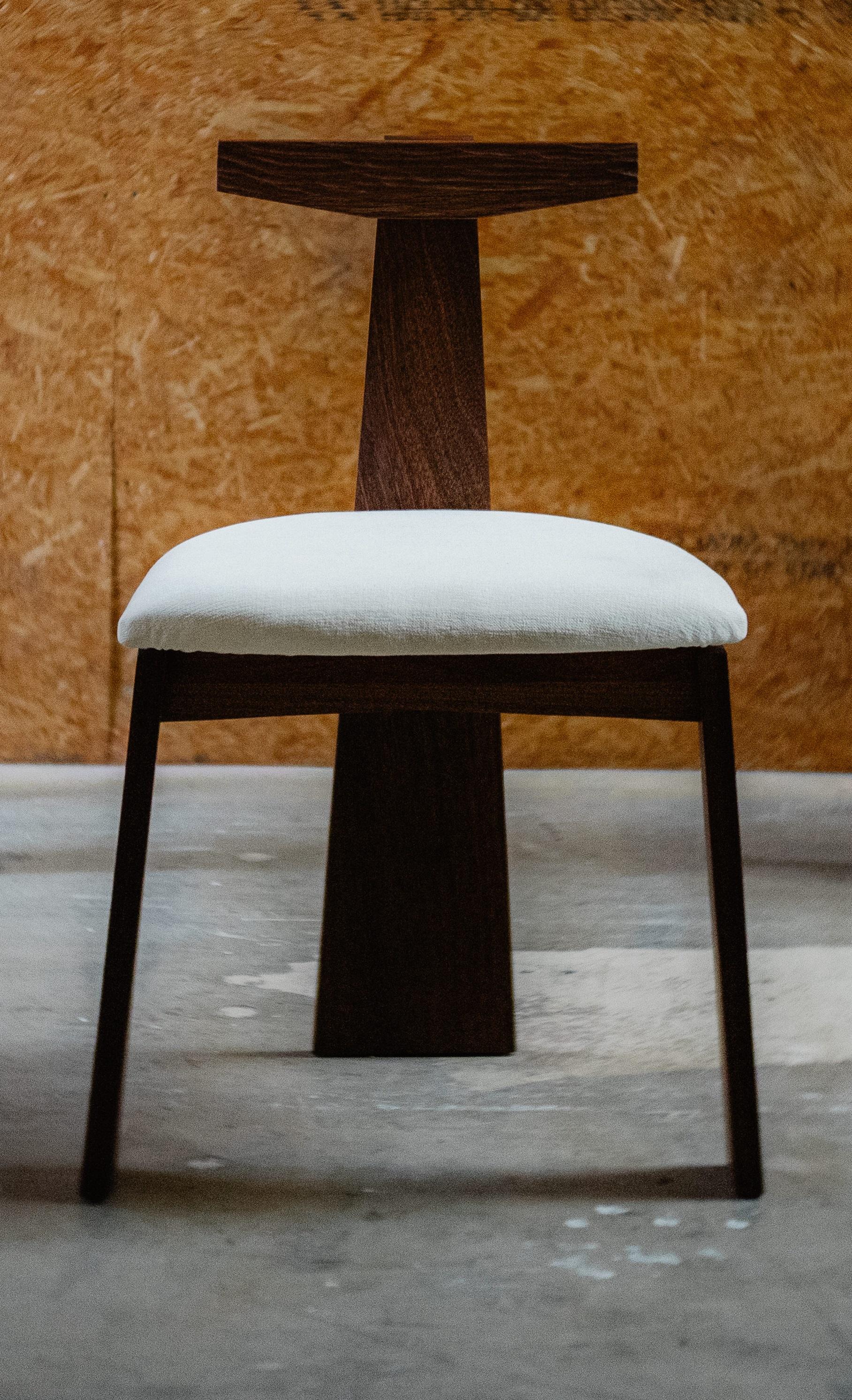 Urithi dining chair by Albert Potgieter Designs
Dimensions: D 45 x W 45 x H 80 cm. SH: 45 cm.
Materials: Mahogany.

The Urithi - meaning Heritage. This Dining Chair was designed to capture the heritage of Albert Potgieter within a chair.