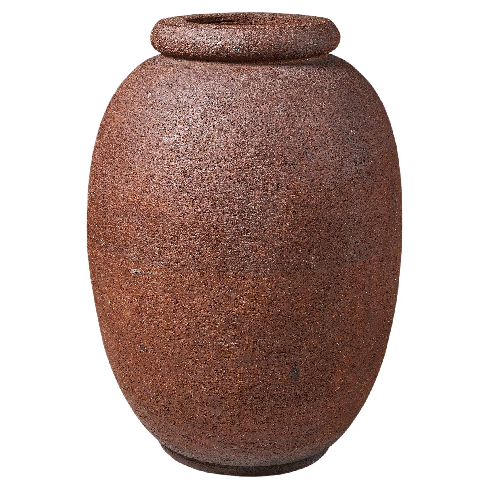 Urn designed by Gunnar Nylund for Rörstrand,
Sweden, 1936.

Stoneware.

Signed.

Dimensions:
H: 78.5 cm / 2' 7''
D: 53 cm / 21''

Exhibitions: In Paris 1937 at the World's Fair, Gunnar Nylund's garden urns were placed on the terrace outside the