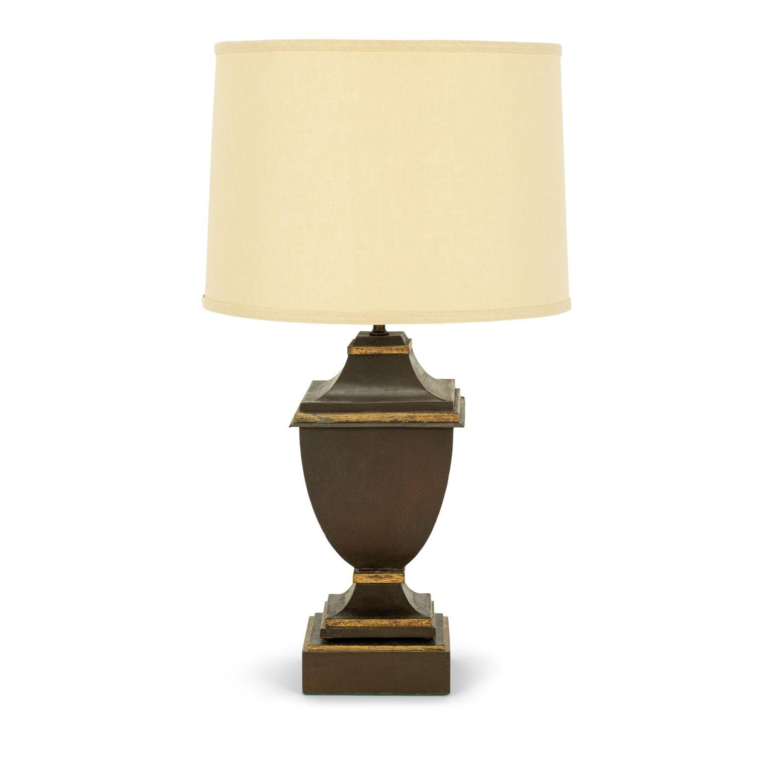 Urn-shape tole table lamp, newly wired for use within the USA using UL listed parts. Hand-painted with gilt trim decoration. Includes complimentary linen drum shade (listed measurements include shade).

Note: Original/early finish on antique and