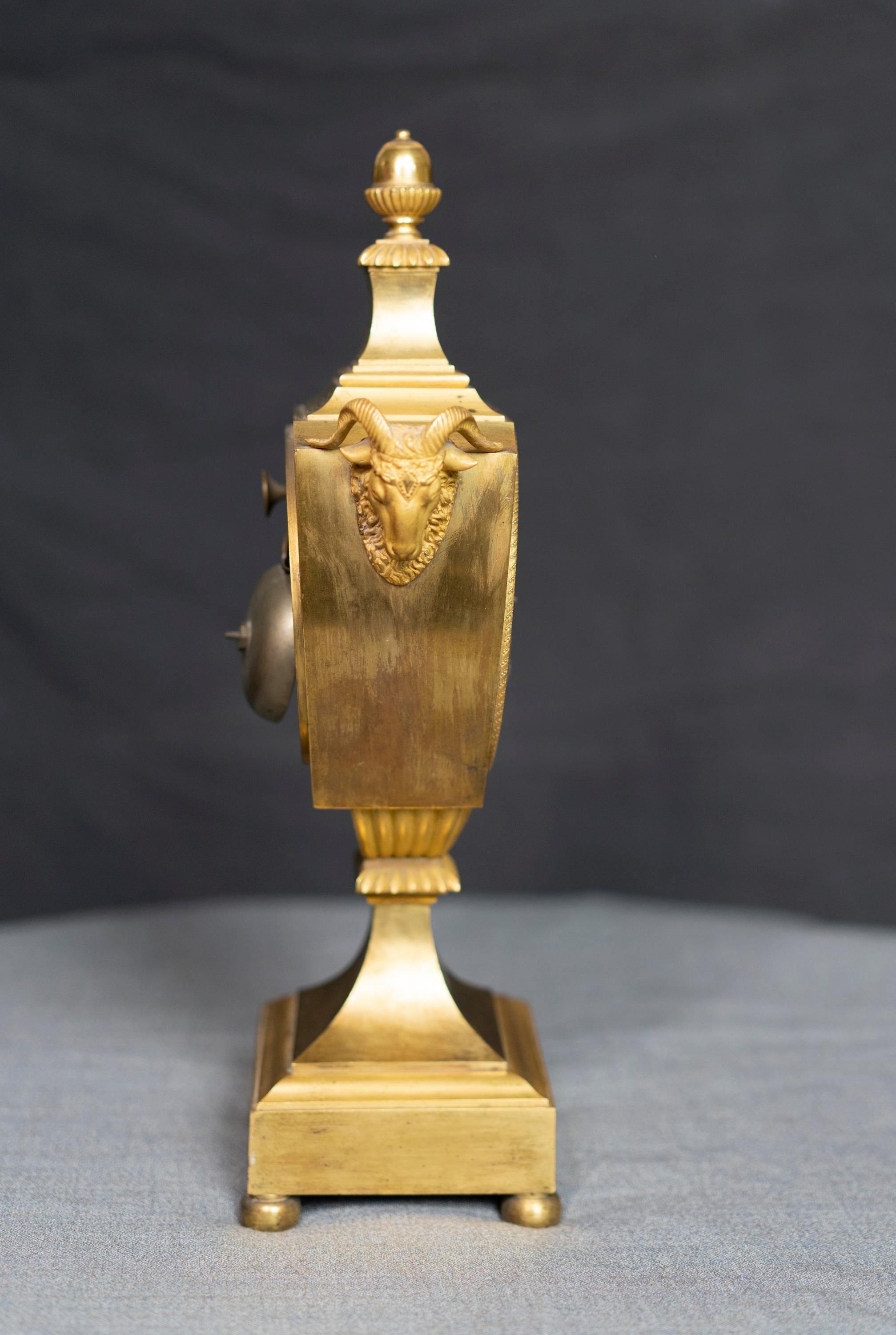 Urn Shaped Louis XVI Period Gilt Bronze Rams Head Clock In Good Condition For Sale In Montreal, QC