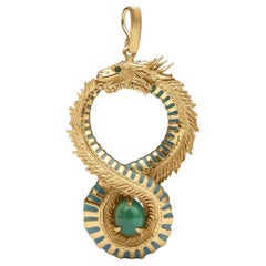 Uroboros pendant in sterling silver with 24k gold vermeil, fire enamel and emera
