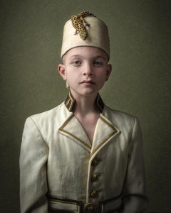 ''Lukah 1'' Dutch Contemporary Portrait of Boy in White Costume with Lizard