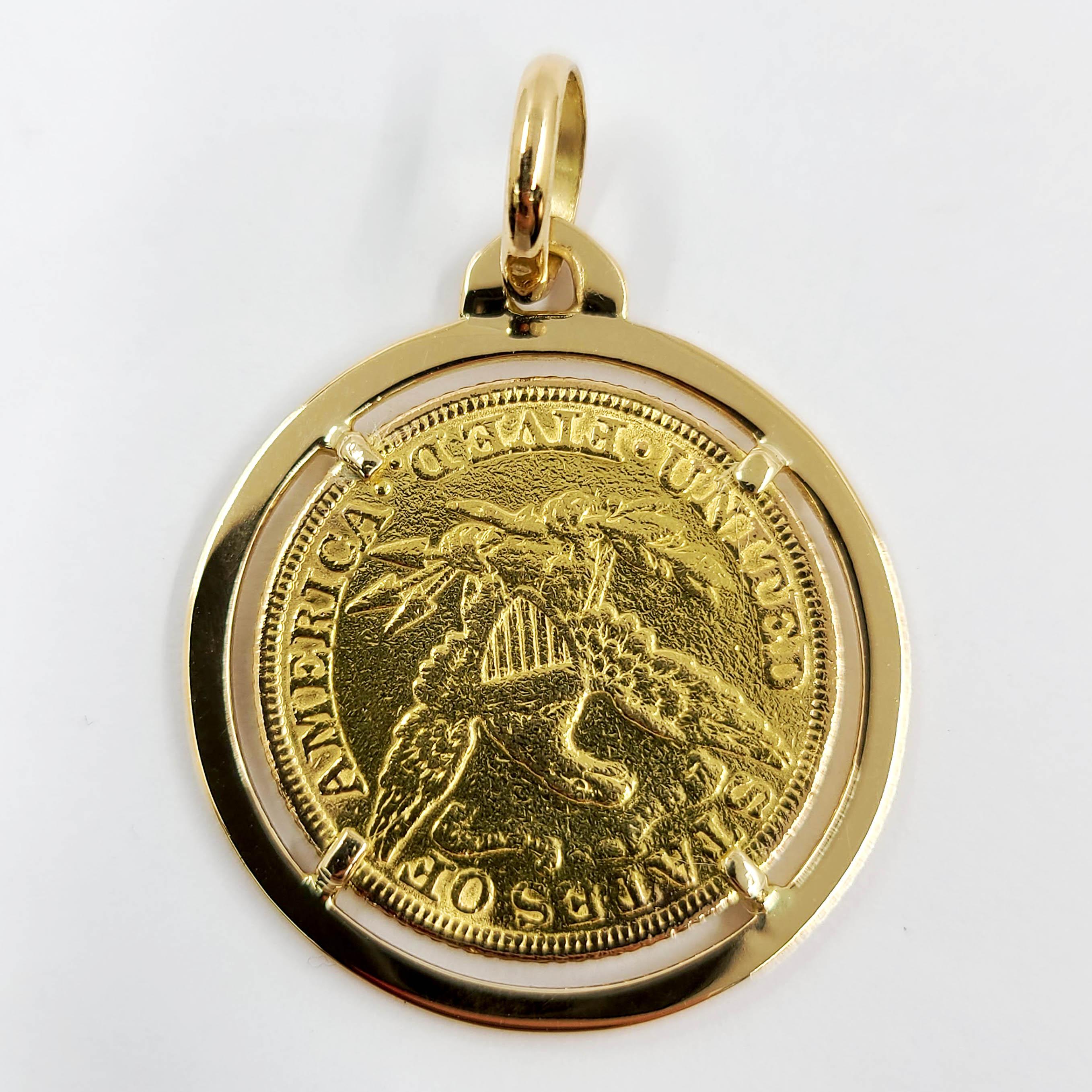 22 Karat Yellow Gold US $5 Coin From 1882 Set In An 18 Karat Yellow Gold Frame With Flexible Jump Ring. Finished Weight is 10.8 Grams.