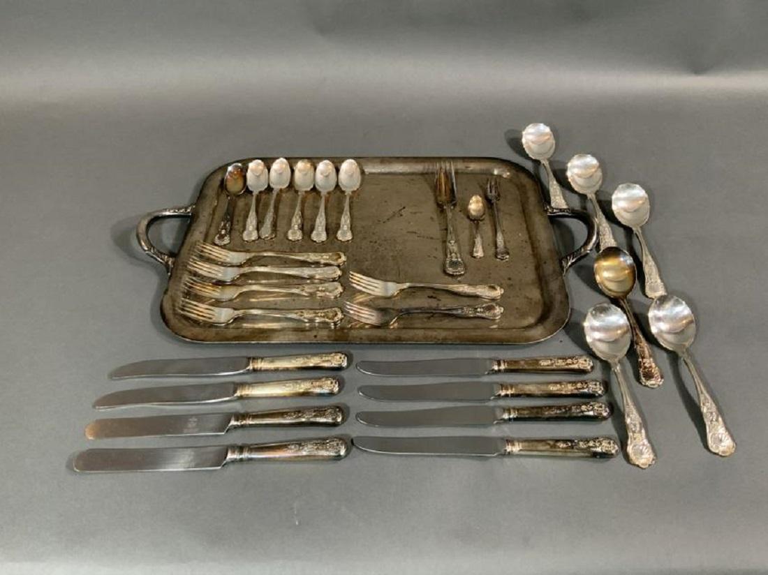 U.S. Navy Officer's Mess silverware tray. Set consists of forks, knives, and spoons along with a tray. All items marked USN with folded anchors.

Overall dimensions: 22