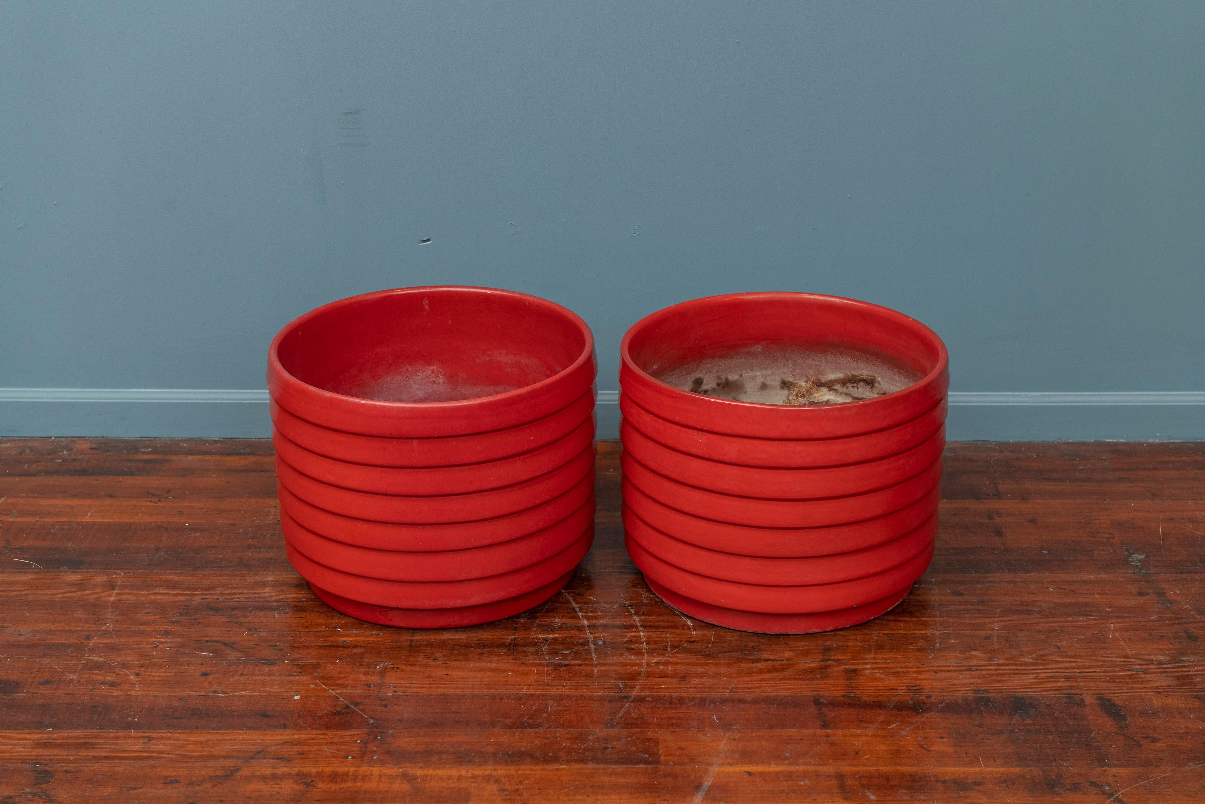 US pottery of paramount ring or ribbed pair of ceramic planters, actual color is more burnt orange than red. Large and impressive, great for the entry way or exterior garden pots.