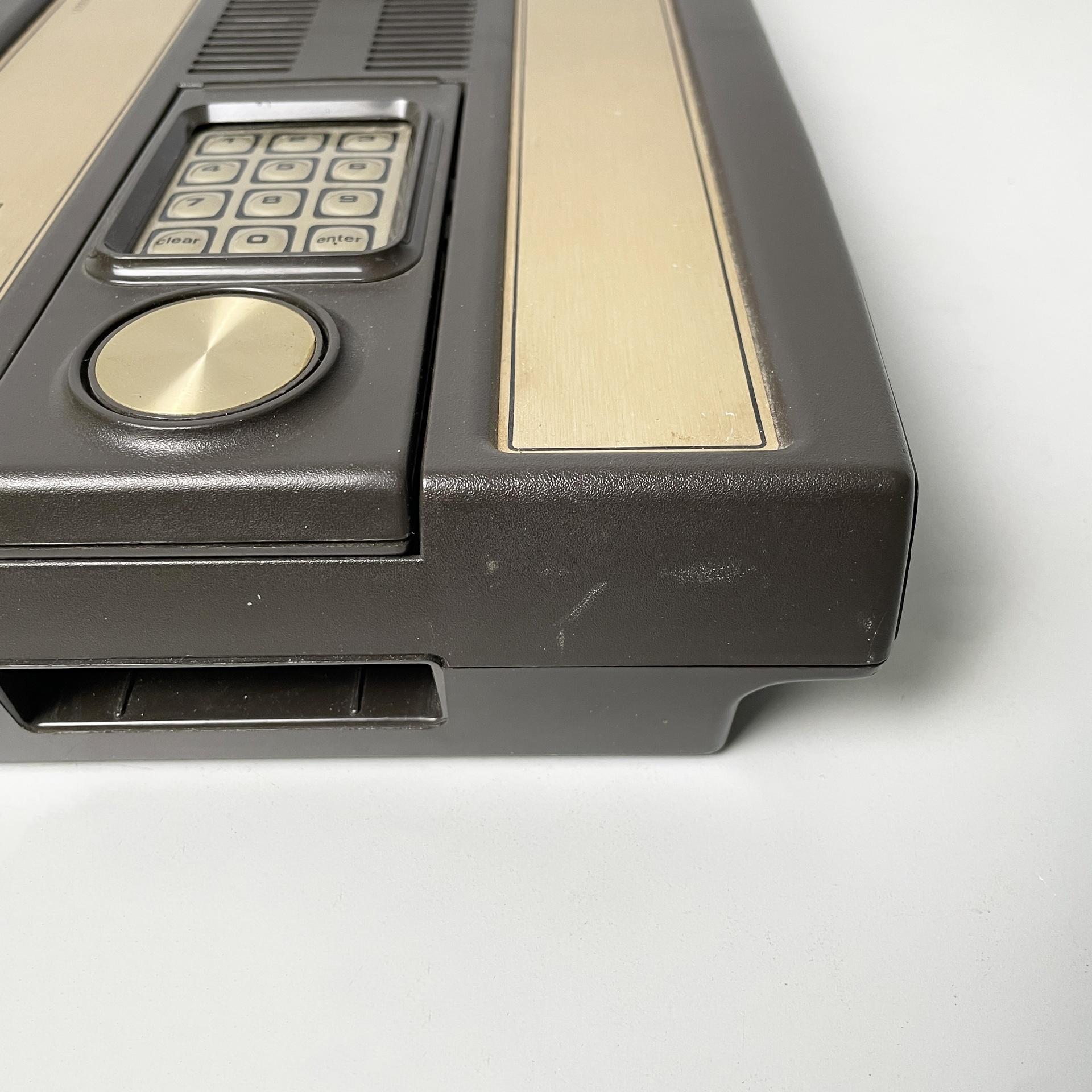 Metal Usa console Intellivision and Tron deadly discs videogame by Mattel, 1980s For Sale