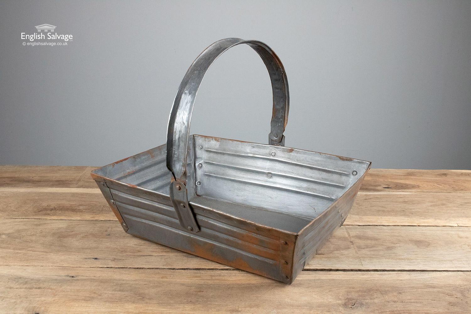 Useful metal trays or trugs with carrying handles and banding to sides. Handmade, so each piece will vary somewhat in looks and size (measurements below are a guide and exclude the handle). Some surface rust and marks throughout.