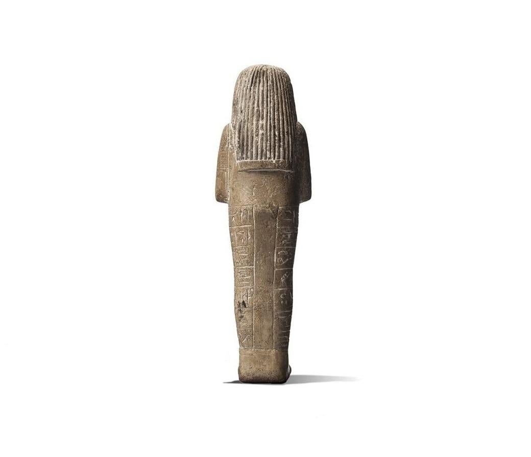 An Ushabti is a funerary figurine used throughout ancient Egypt, placed in a tomb to aid as a servant to the deceased, conducting manual labour for them in the afterlife. Often accompanied with various tools to assist their practices such as