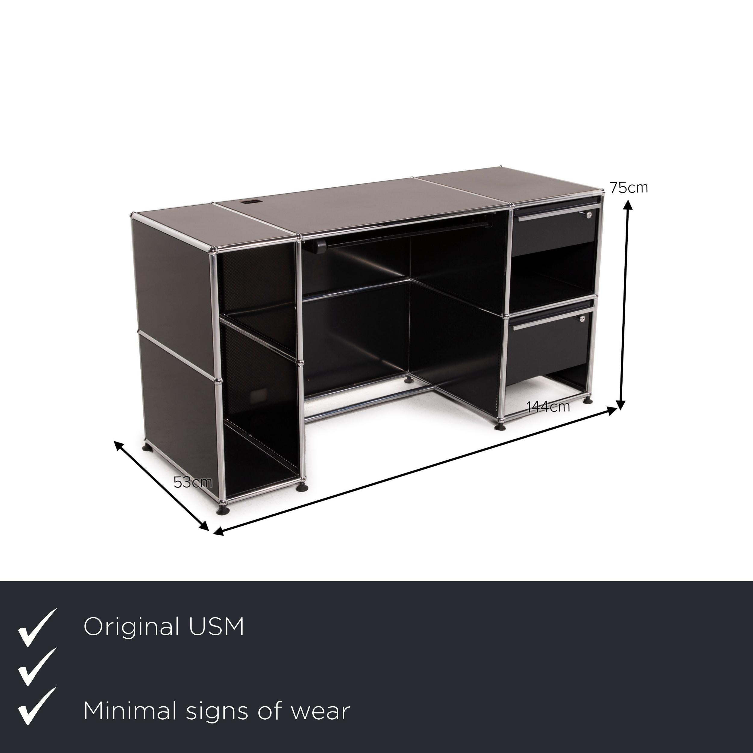 We present to you an USM Haller metal desk black 2x drawer.


 Product measurements in centimeters:
 

 Depth: 53
 Width: 144
 Height: 75.





 