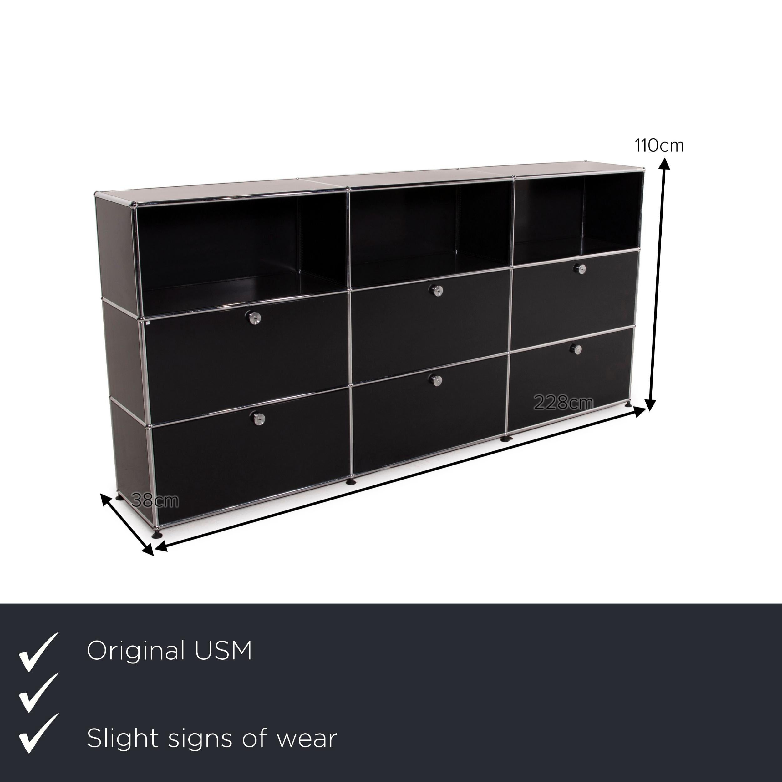 We present to you an USM Haller metal sideboard black highboard drawer shelf compartment 3x3 office.


 Product measurements in centimeters:
 

 Depth: 38
Width: 228
 Height: 110.





 