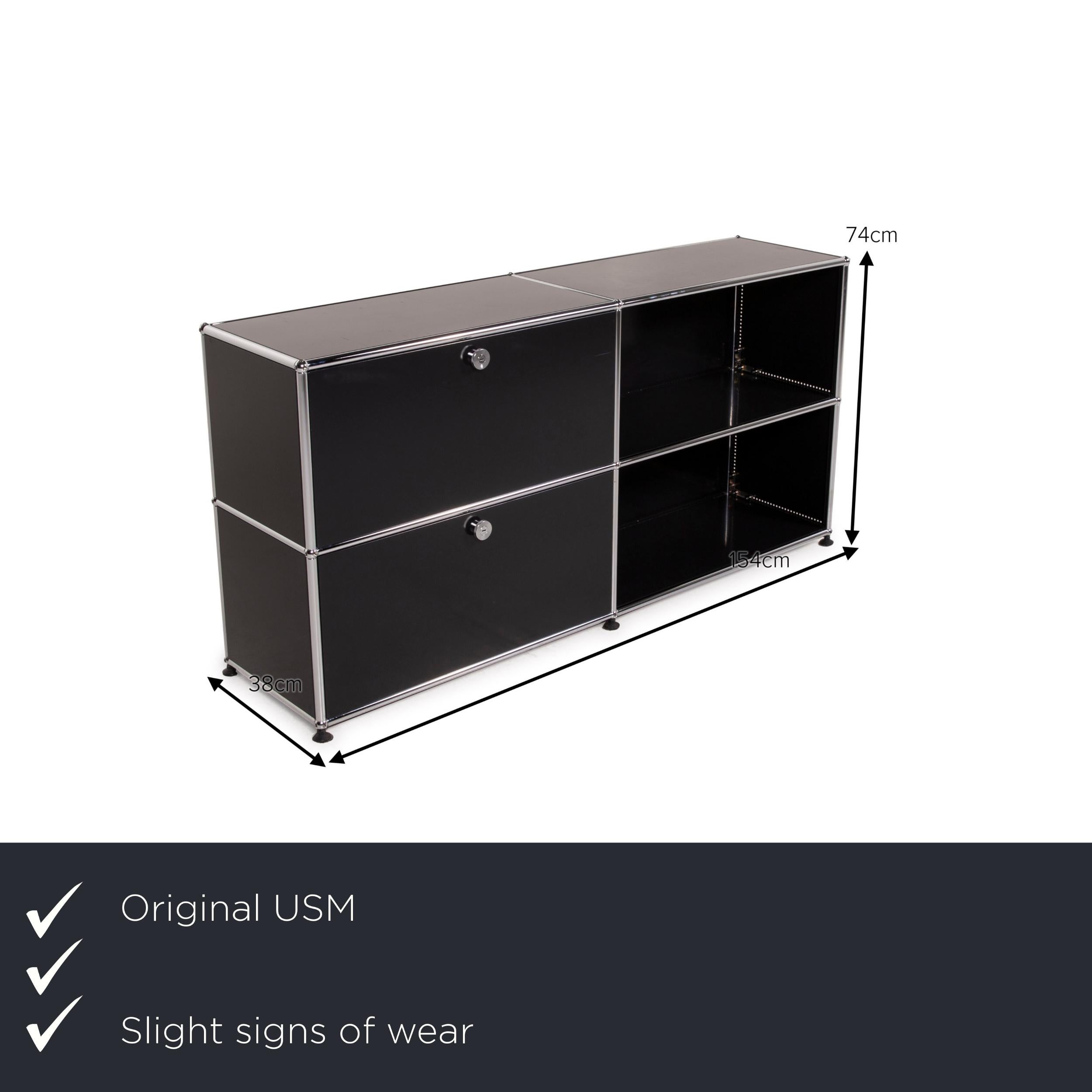 We present to you an USM Haller metal sideboard black highboard drawer shelf compartment office.

 

 Product measurements in centimeters:
 

 Depth: 38
 Width: 154
 Height: 74.




 