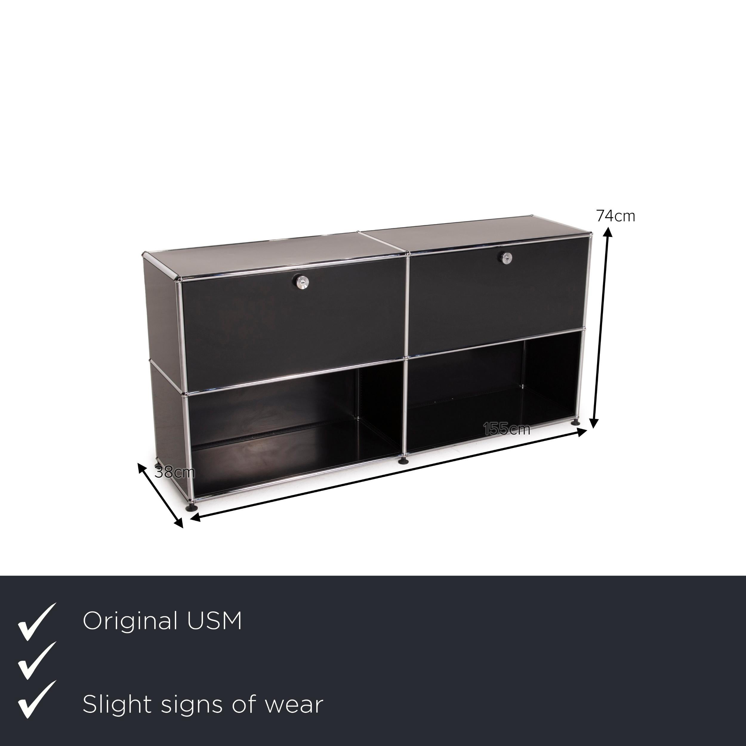 We present to you an USM Haller metal sideboard black high board shelf compartments office.

Product measurements in centimeters:

Depth 38
Width 154
Height 74.







  