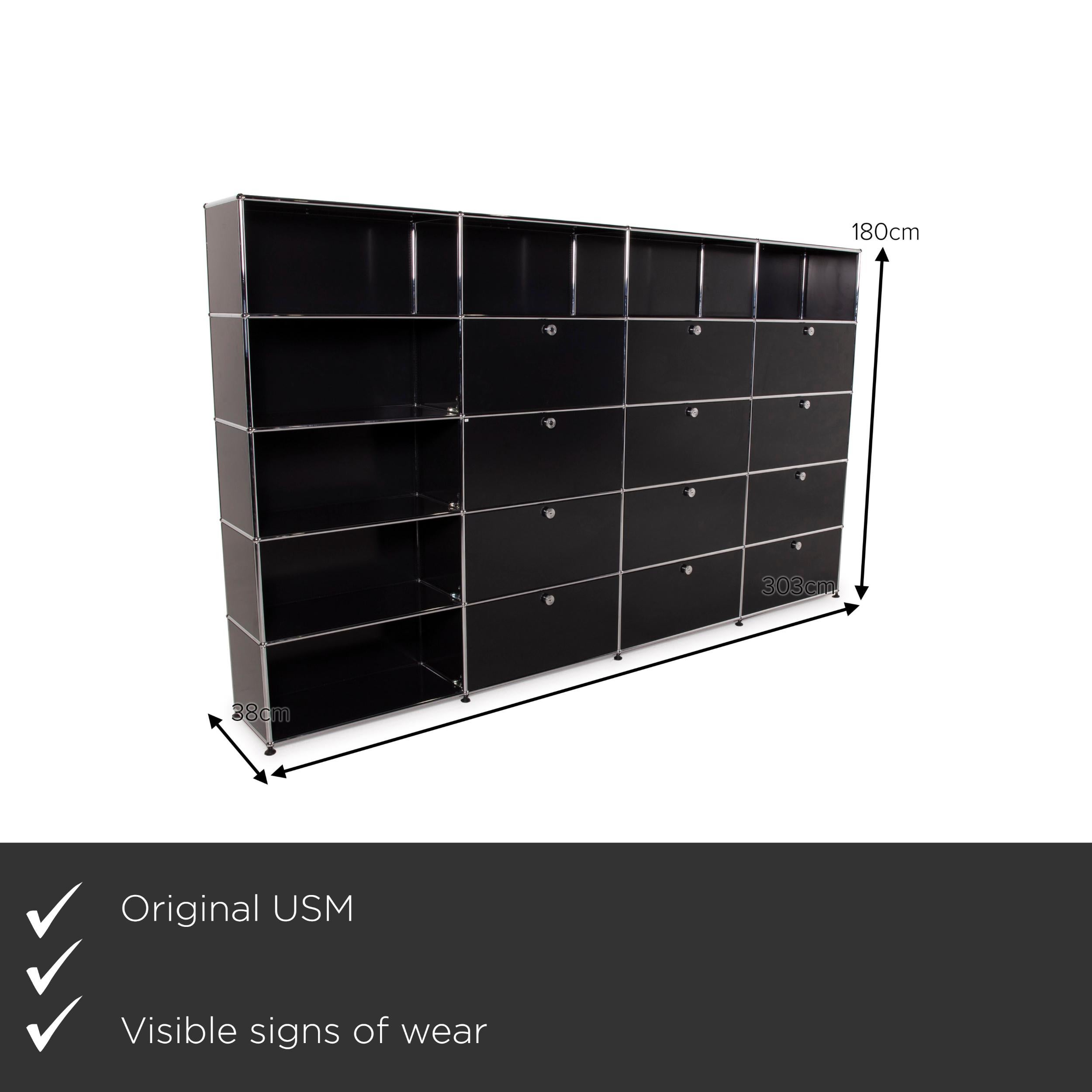 We present to you an USM Haller metal wall unit black shelf 4x5 compartments office.
 
 

 Product measurements in centimeters:
 

Depth: 37
Width: 303
Height: 180.
 
 
 
 
 