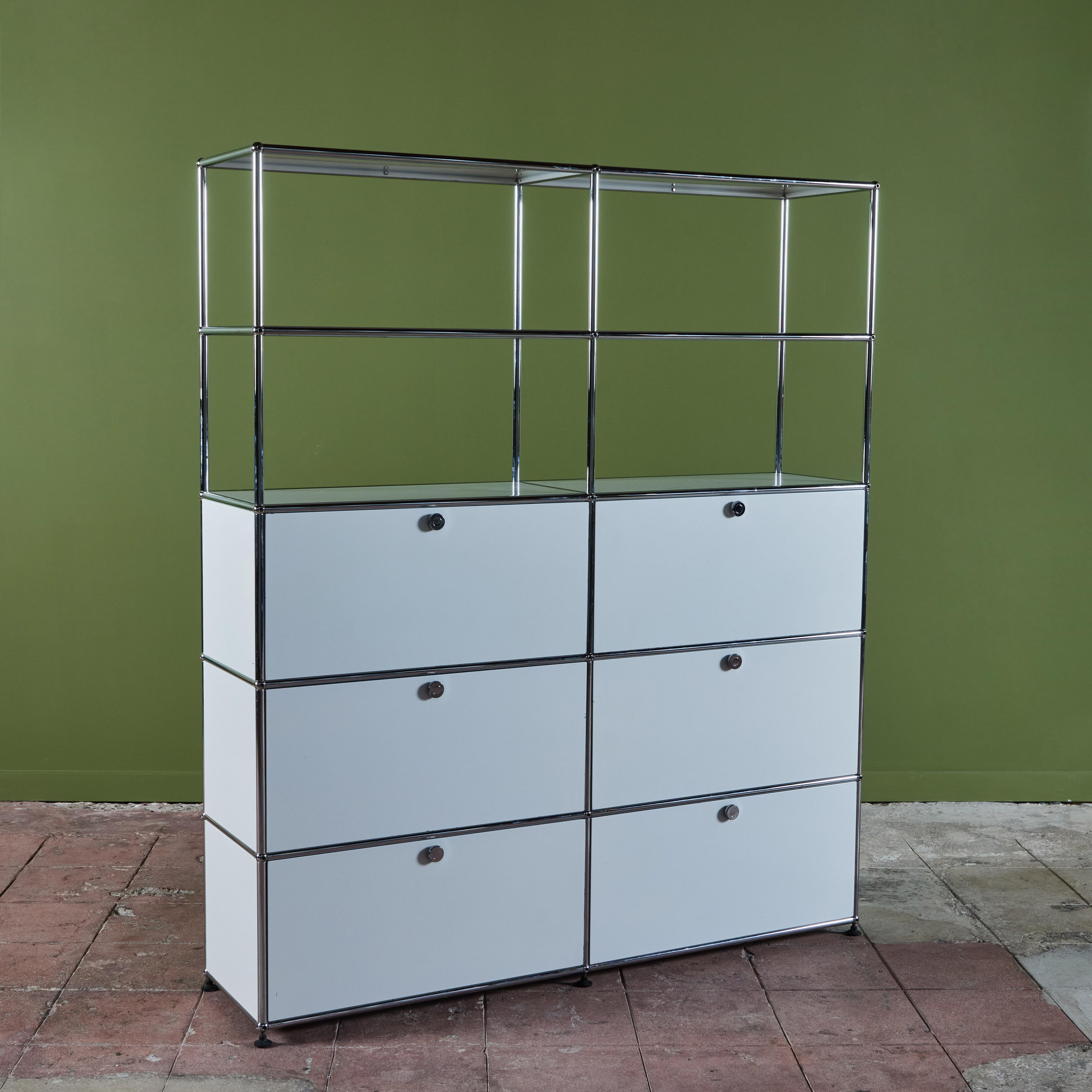 Architect Fritz Haller was commissioned by USM Modular Furniture in the 1960s to create a USM Haller shelving unit. This storage system, made in Switzerland, was created based on three basic construction elements; a ball, screw in connecting tubes