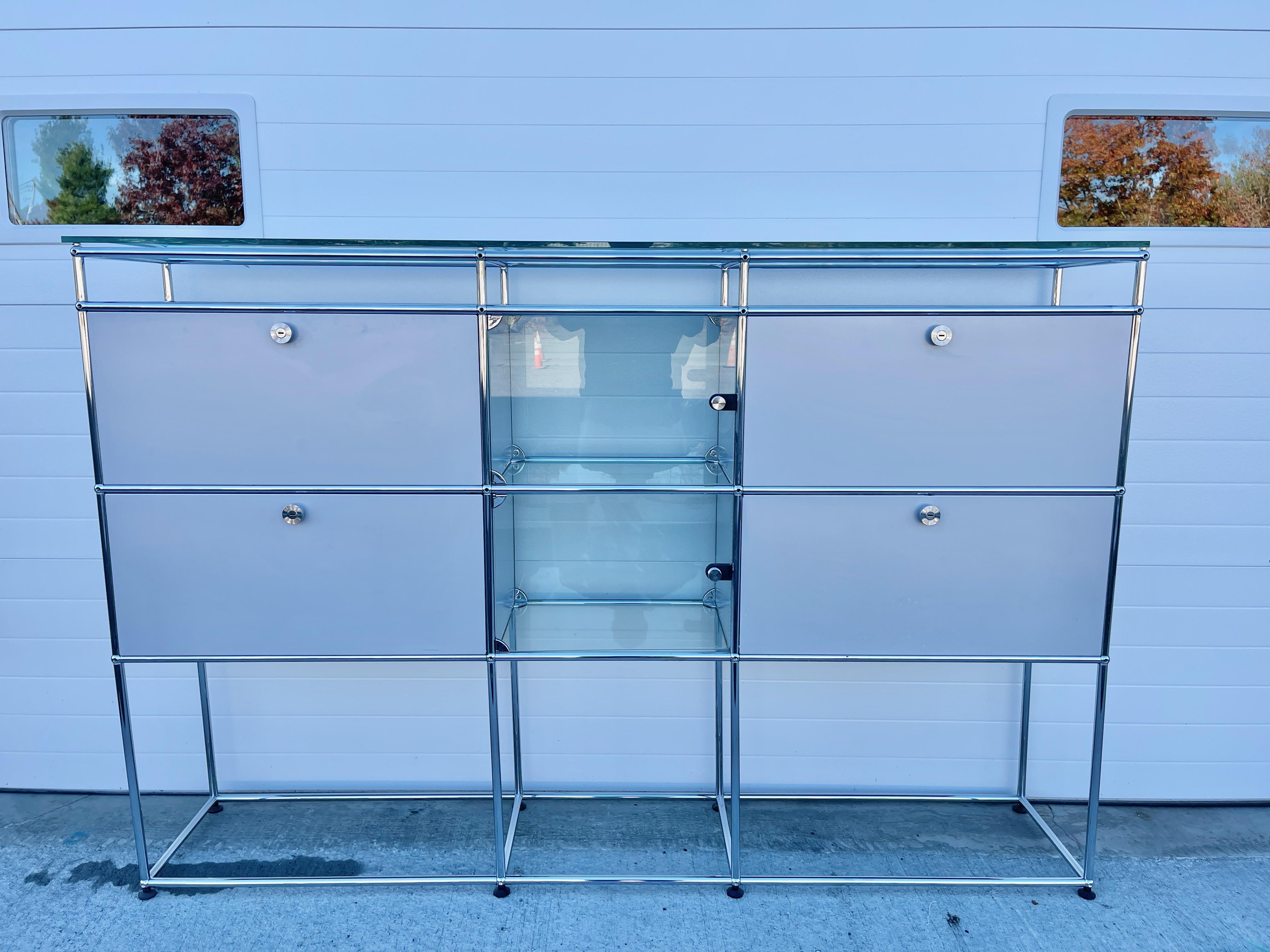 Uniquely configured storage system by USM Haller.
Phenomenally stylish and functional for home or office, as a dry bar or file storage. Mixes well with all other design styles. 
We acquired this directly from the Swiss Consulate in Cambridge,