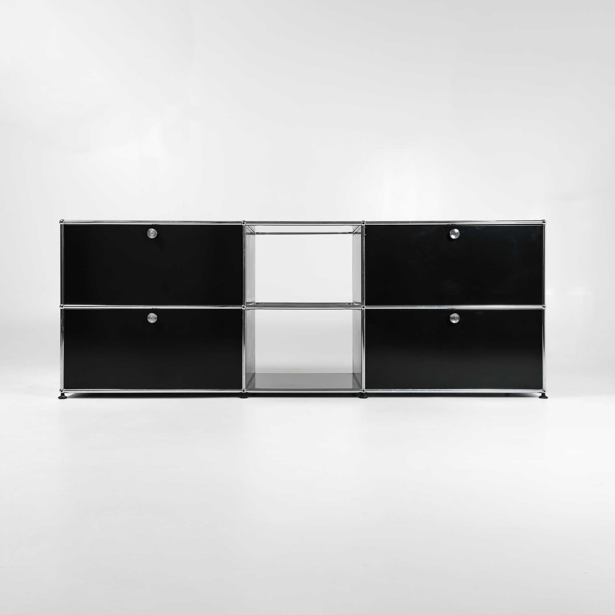 This is a modular USM Haller two tier three column cabinet/credenza in Graphite Black in Switzerland, in overall good condition, some wears and scratches on the surface. In overall good condition, ready to be used. This unit has 4 drawers with soft