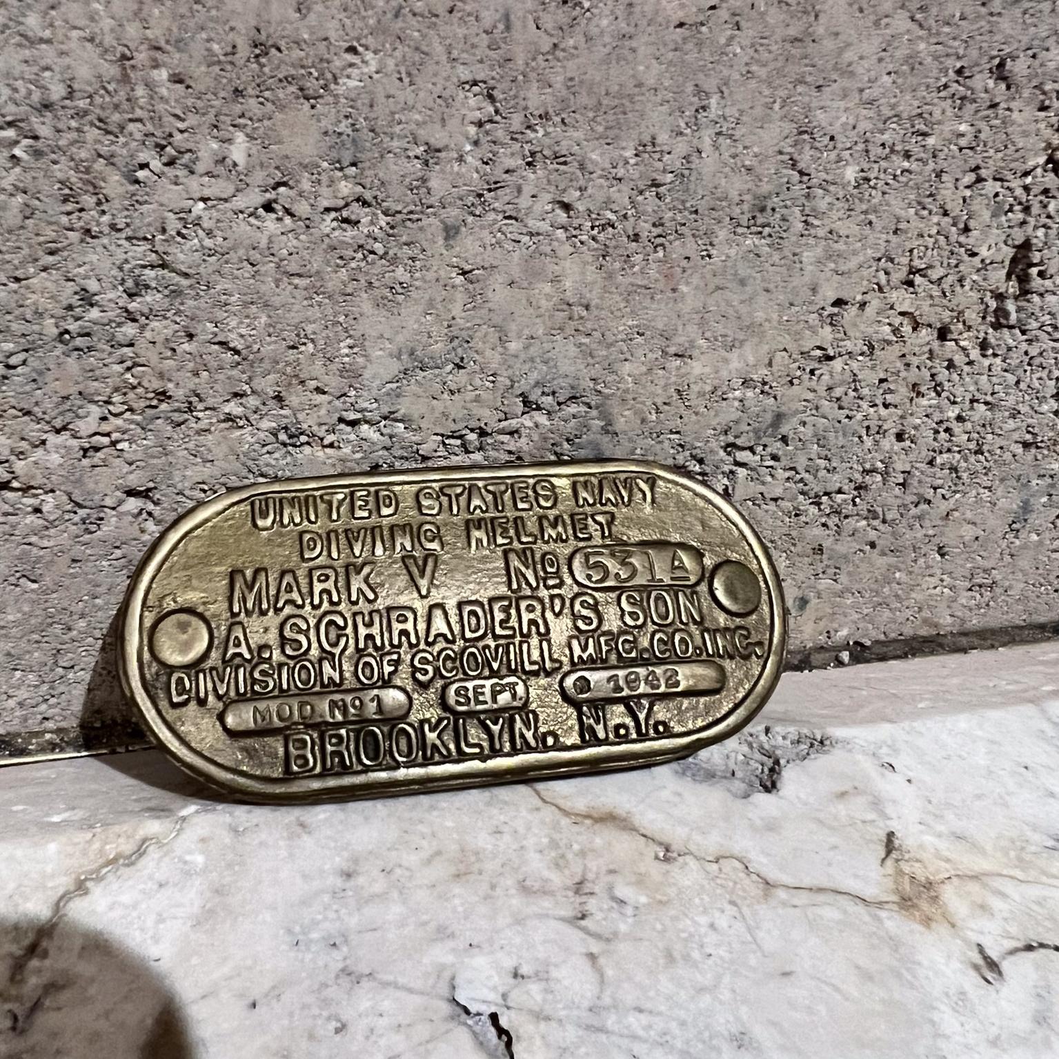 AMBIANIC presents
USN Navy Brass Diving Helmet Data Plate Belt Buckle
by A. Schrader's Son Inc.
.5 d x 4 long x 1.75 h
original vintage condition
refer to images provided