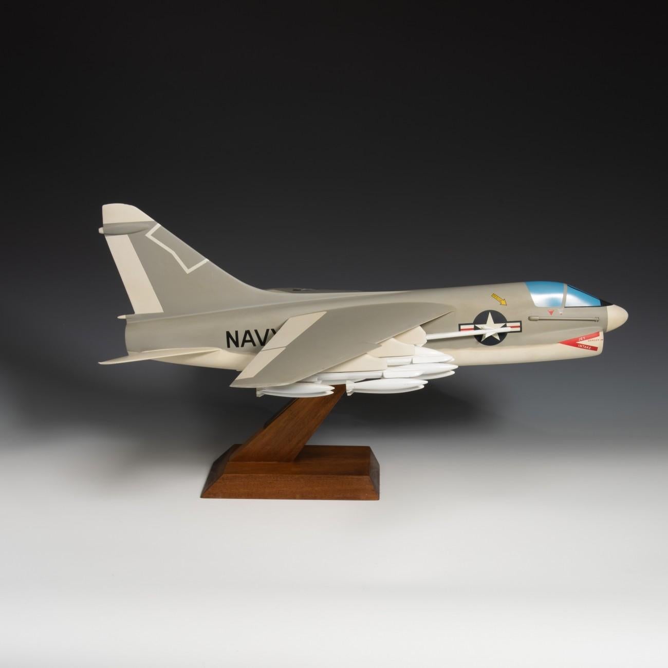 An exceptional painted aluminium and wood naval model of the LTV ( Ling-Temco-Vought) A-7 Corsair II fighter jet airplane. In United States Navy (USN) livery. Made by a celebrated Dutch model maker, Maarten Matthijs Verkuyl, a specialist model maker