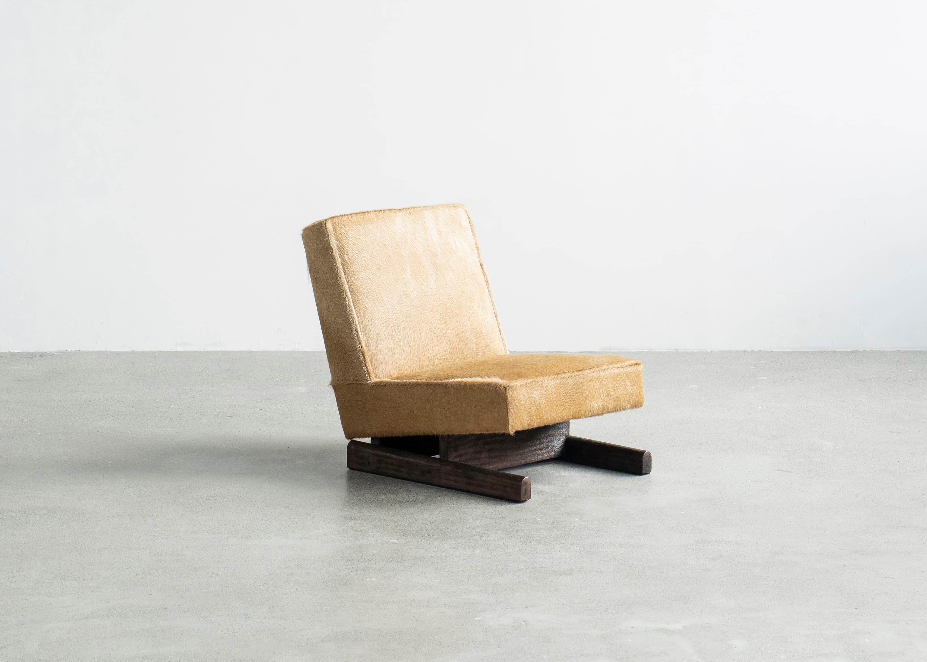 Ut 01 Sofa by Sing Chan 
Dimensions: W 76 x D 56 x H 67 cm
Materials: Cowhide, North American Black Walnut, waxing.

Sing Chan ( Chinese: 陈星宇/Xingyu Chen), the founder of SINGCHAN DESIGN, was born in 1990 and graduated from the Department of