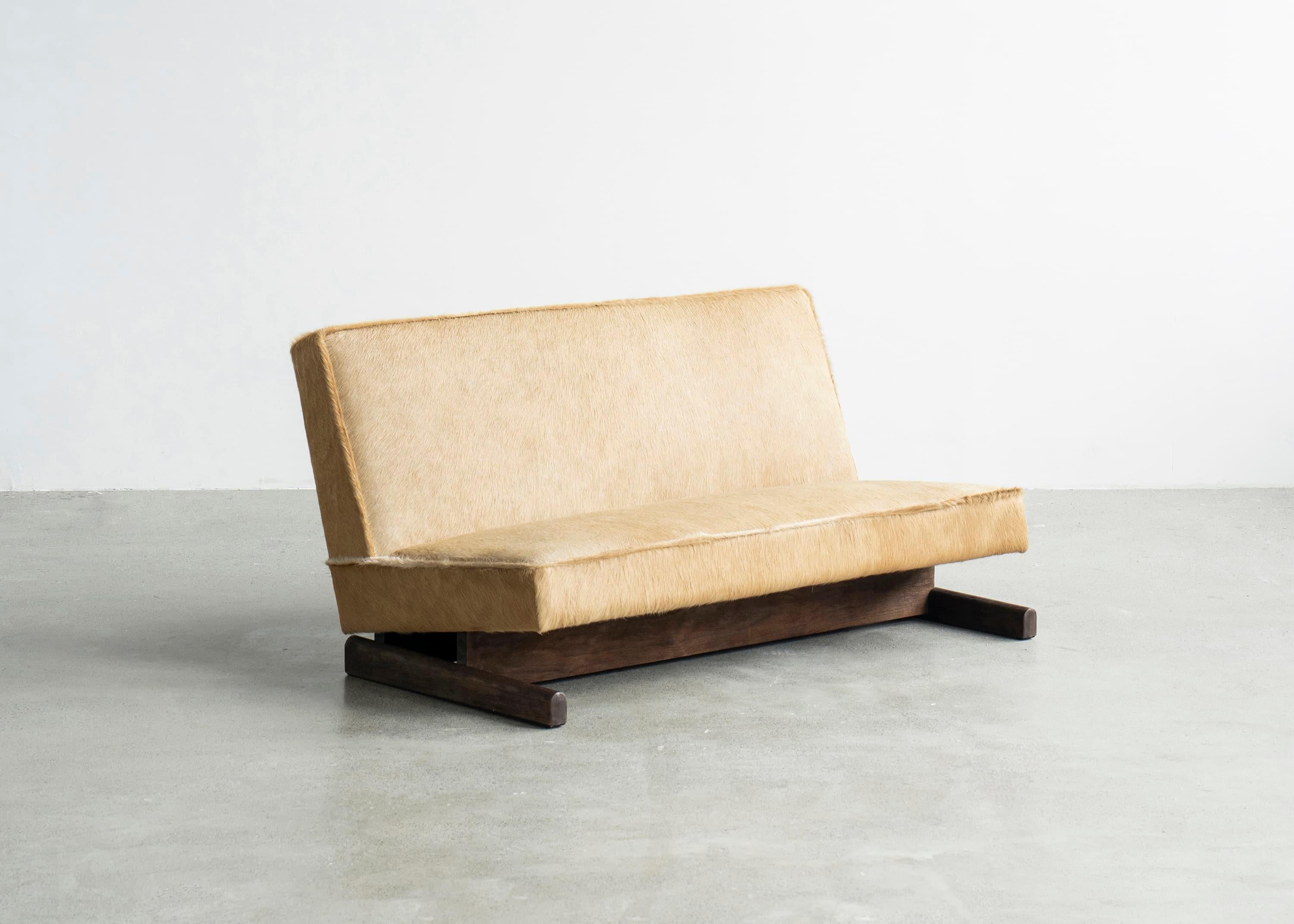 Ut 02 Sofa by Sing Chan 
Dimensions: W 76 x D 135 x H 67 cm
Materials: Cowhide, North American Black Walnut, waxing.

Sing Chan ( Chinese: 陈星宇/Xingyu Chen), the founder of SINGCHAN DESIGN, was born in 1990 and graduated from the Department of