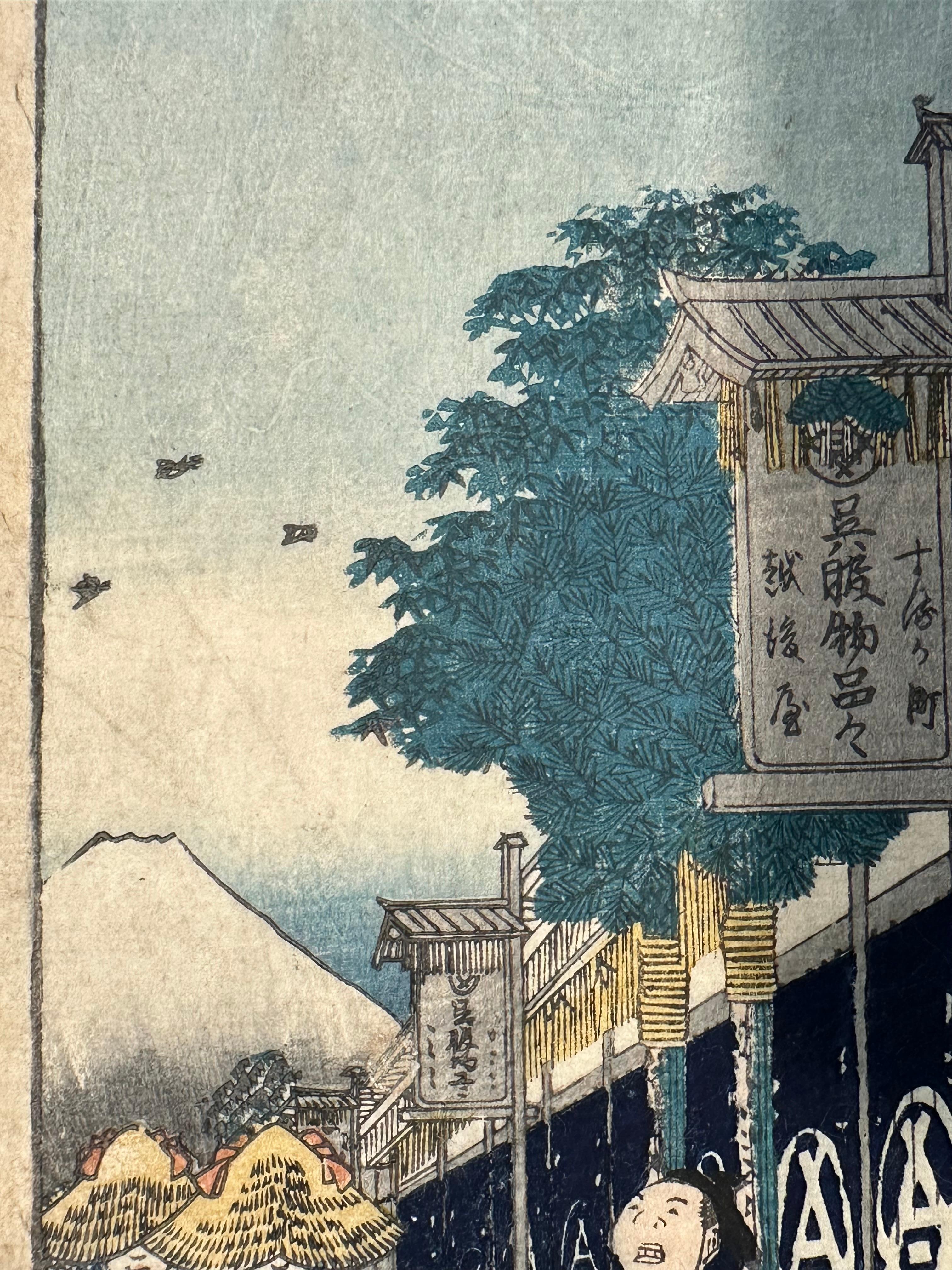 Hiroshige Utagawa, The Suruga District in Edo - Print di Utagawa Hiroshige