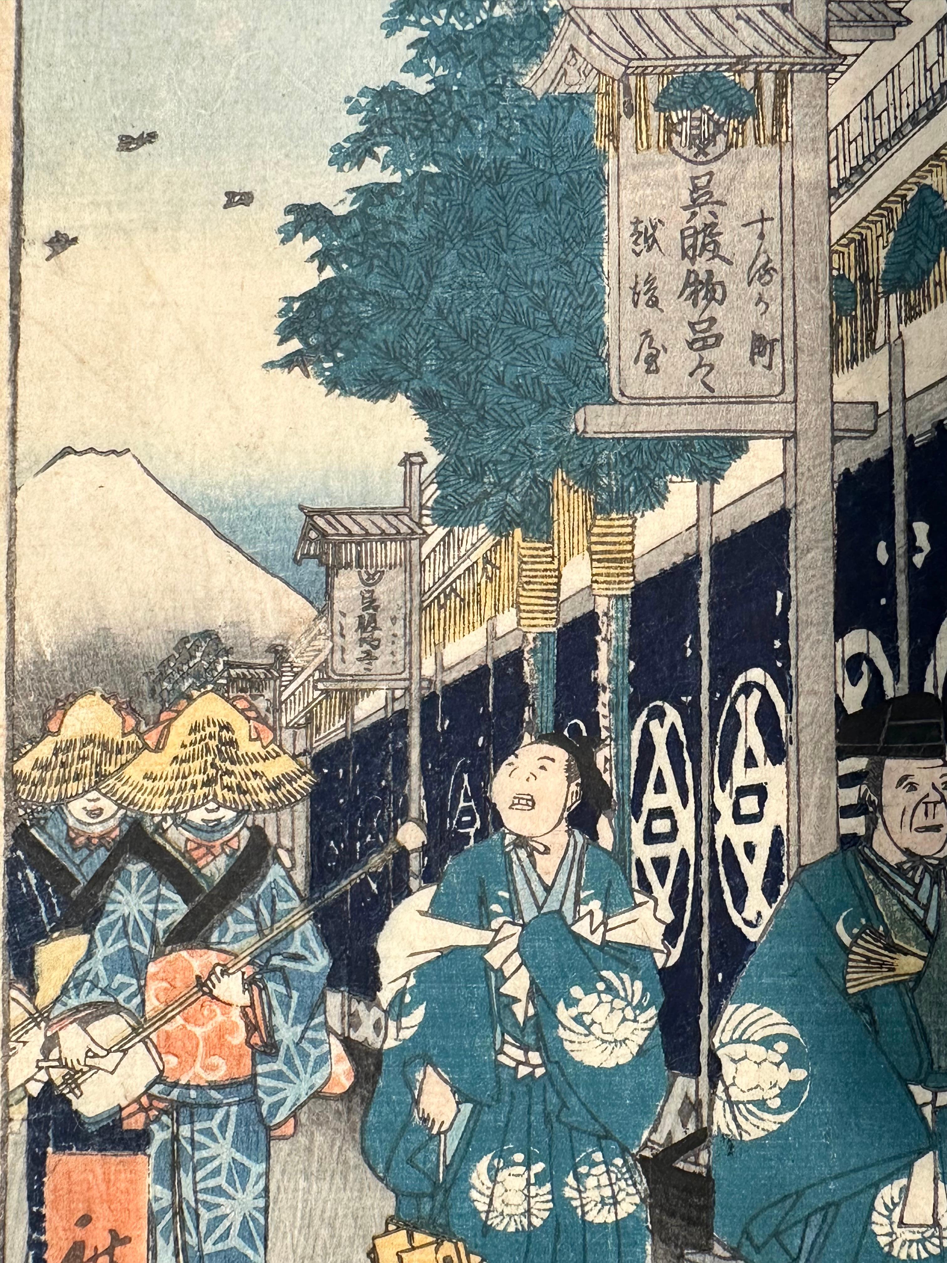 HIROSHIGE UTAGAWA I, Edo 1797 - 1858
The Suruga District in Edo (Tôto Suruga-chô), from the series Thirty-six Views of Mount Fuji (Fuji sanjûrokkei) 
Nishiki-e. Xilografia a colori, firmata in lastra: Hiroshige Ga
Serie: Serie: Fuji Sanju Rokkei; 
