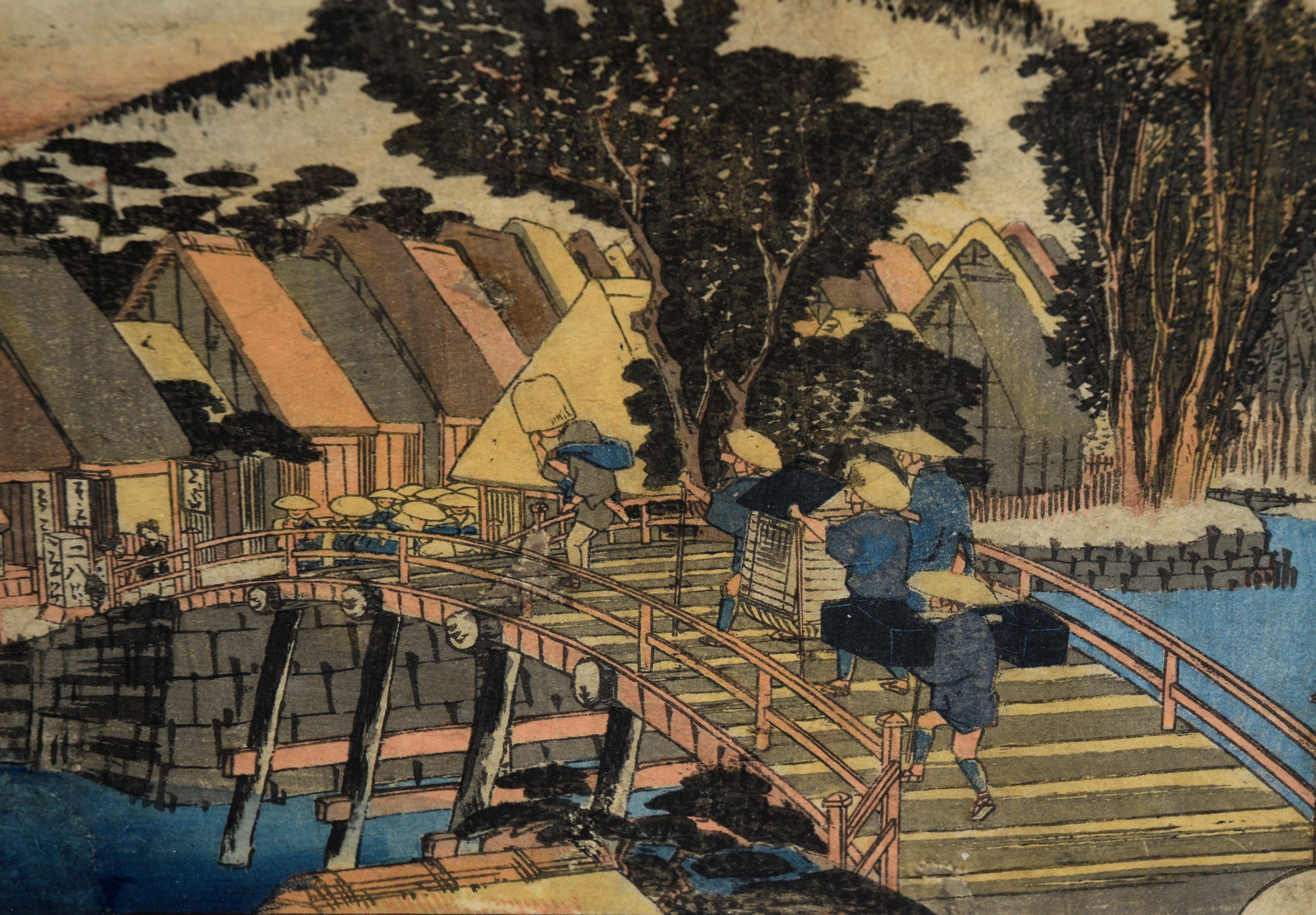 Ponte Shin-machi a Hodogaya - Stampa xilografica giapponese su carta di riso

Stampa xilografica di viaggiatori su un ponte di Utagawa Hiroshige (giapponese, 1797-1858). Pubblicata originariamente nel 1833, questa è la scena numero 5 de Le 53