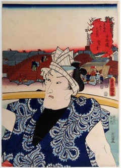Man in Blue Coat Carrying Goods - Woodcut by Utagawa Kunisada - 19th Century