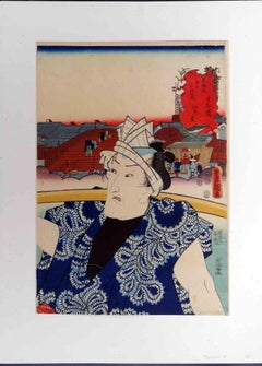 Der Träger im blauen Mantel - Holzschnitt von Utagawa Kunisada - Mitte des 19. Jahrhunderts