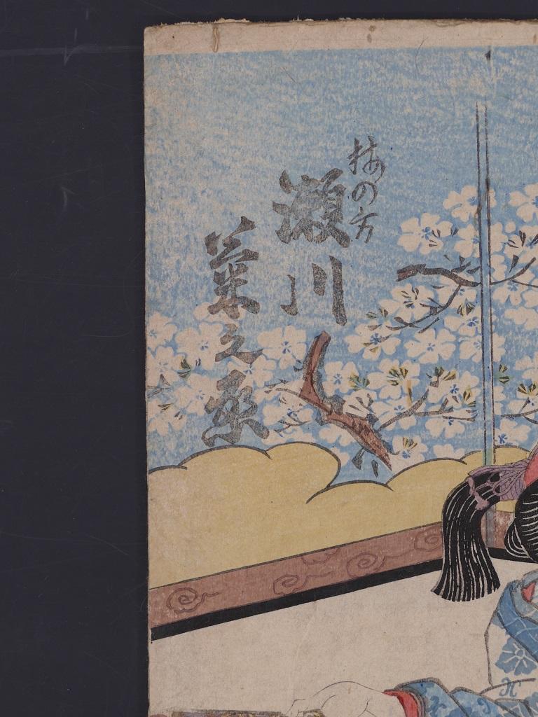 Kabuki Theatre Scene is a color woodblock print on paper, realized by Utagawa Toyokuni II around 1810 ca.

This lovely ukiyo-e print depicts a kneeling actress, more precisely a geisha, wearing a precious and richly decorated kimono, during a