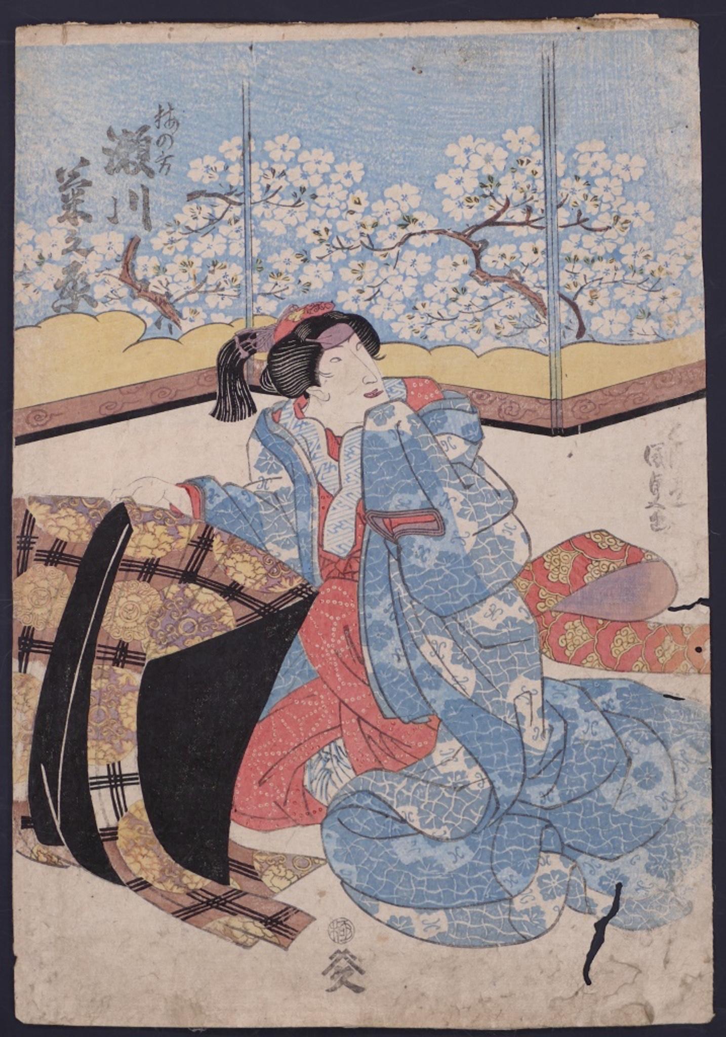 Scène de théâtre Kabuki est une gravure sur bois en couleur sur papier, réalisée par Utagawa Toyokuni II vers 1810 ca.

Cette belle estampe ukiyo-e représente une actrice agenouillée, plus précisément une geisha, vêtue d'un kimono précieux et