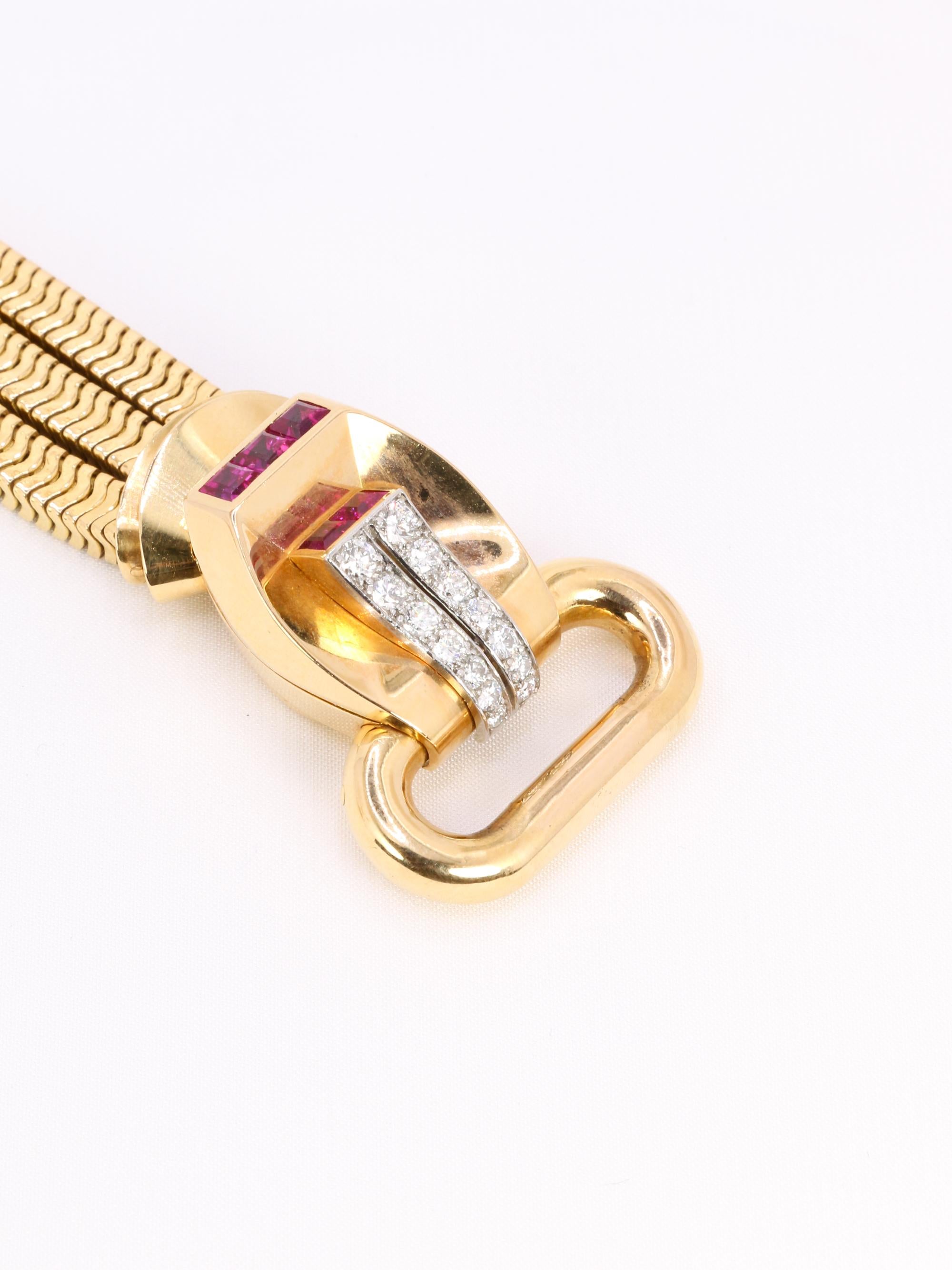 UTI - Geheime Uhr aus Gold, Diamanten und kalibrierten Rubinen (Art déco) im Angebot