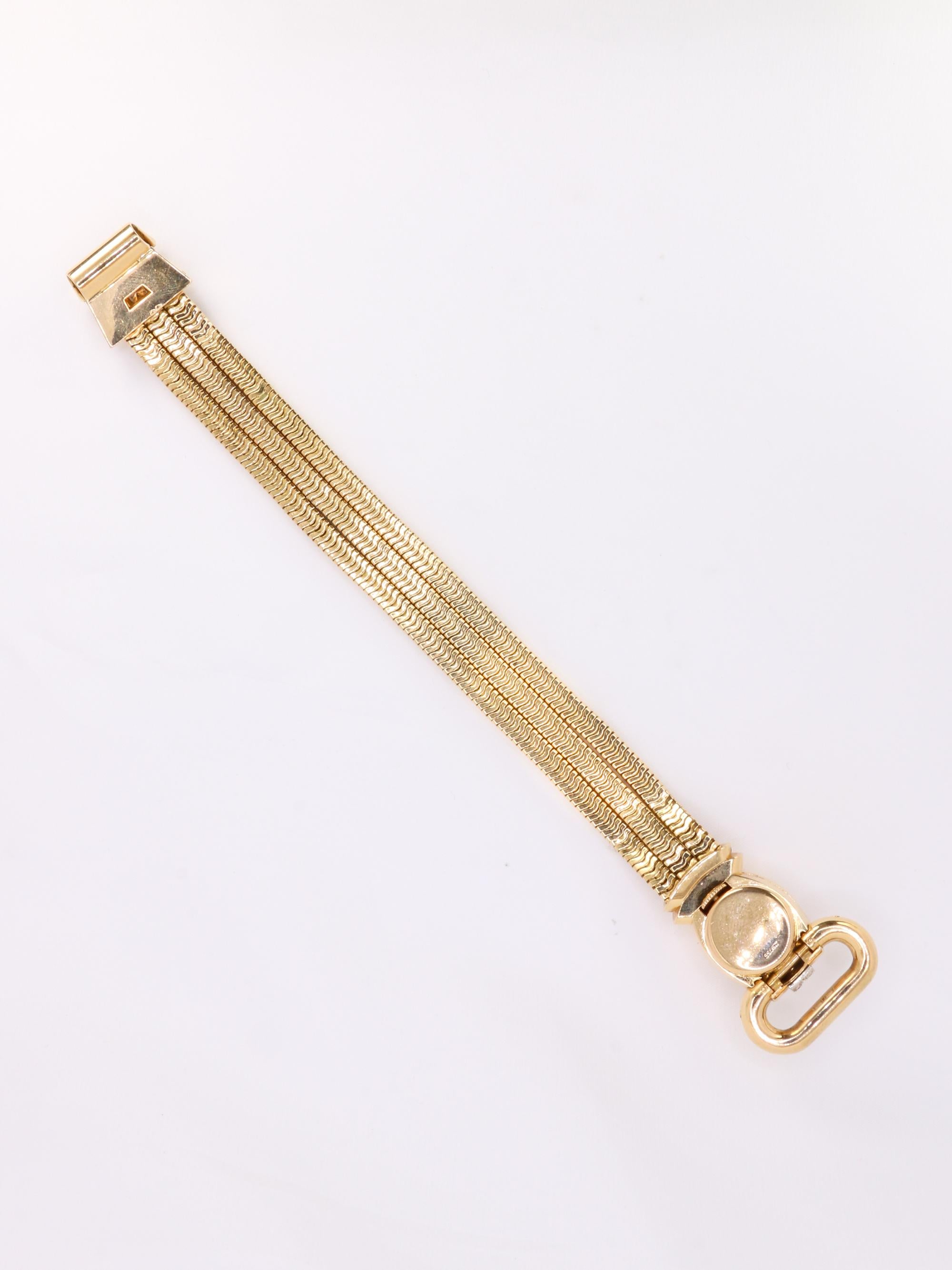 UTI - Geheime Uhr aus Gold, Diamanten und kalibrierten Rubinen (Brillantschliff) im Angebot